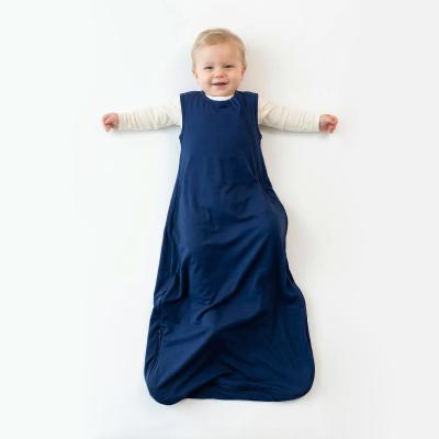 Baby wearing a 2.5 TOG bamboo sleep sack