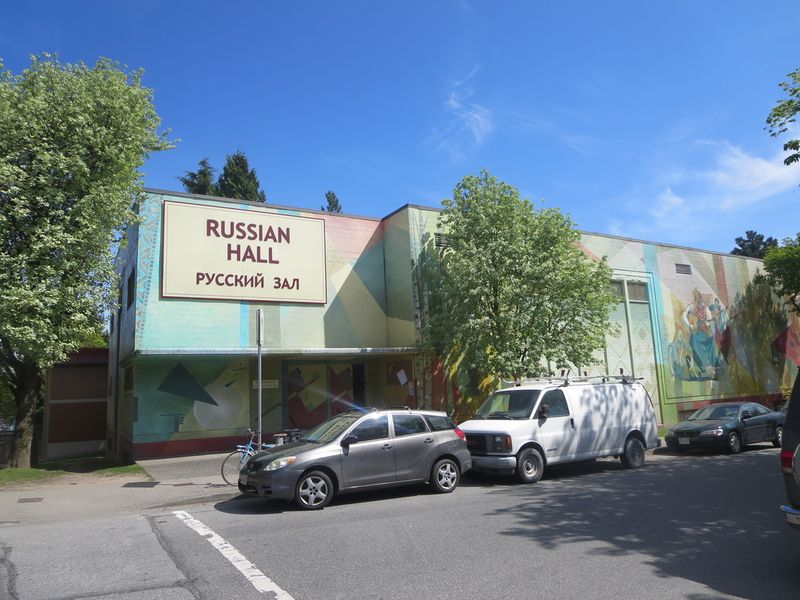 The Russian Hall from across Campbell Avenue, its name painted on the corner of the mural