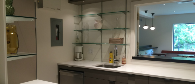 The servery counter, with glass shelves and a serving window