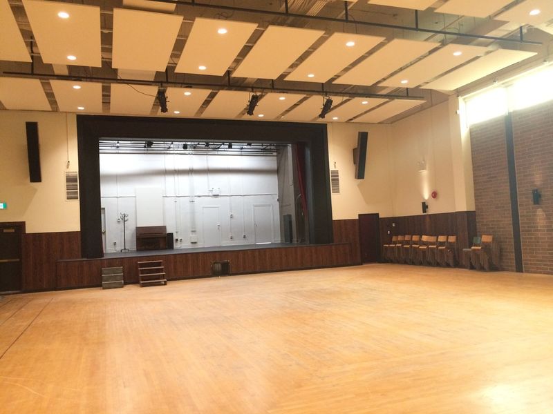 The Upstairs Hall and its stage, seen from the corner of the room