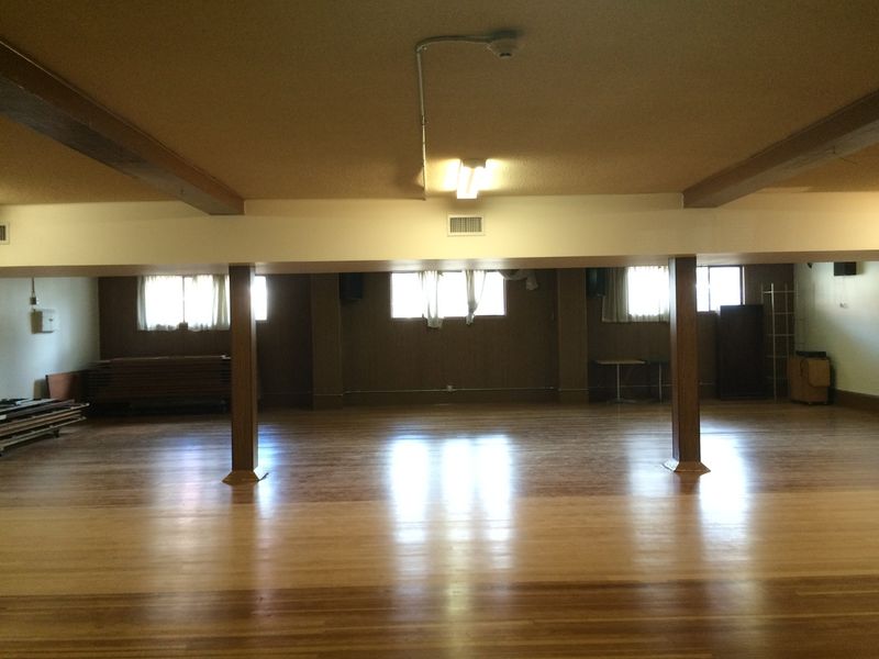 The Downstairs Hall looking along the row of supporting posts