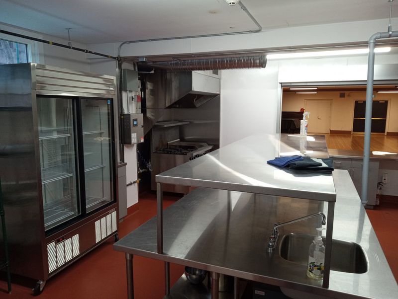 The kitchen serving window and prep counter