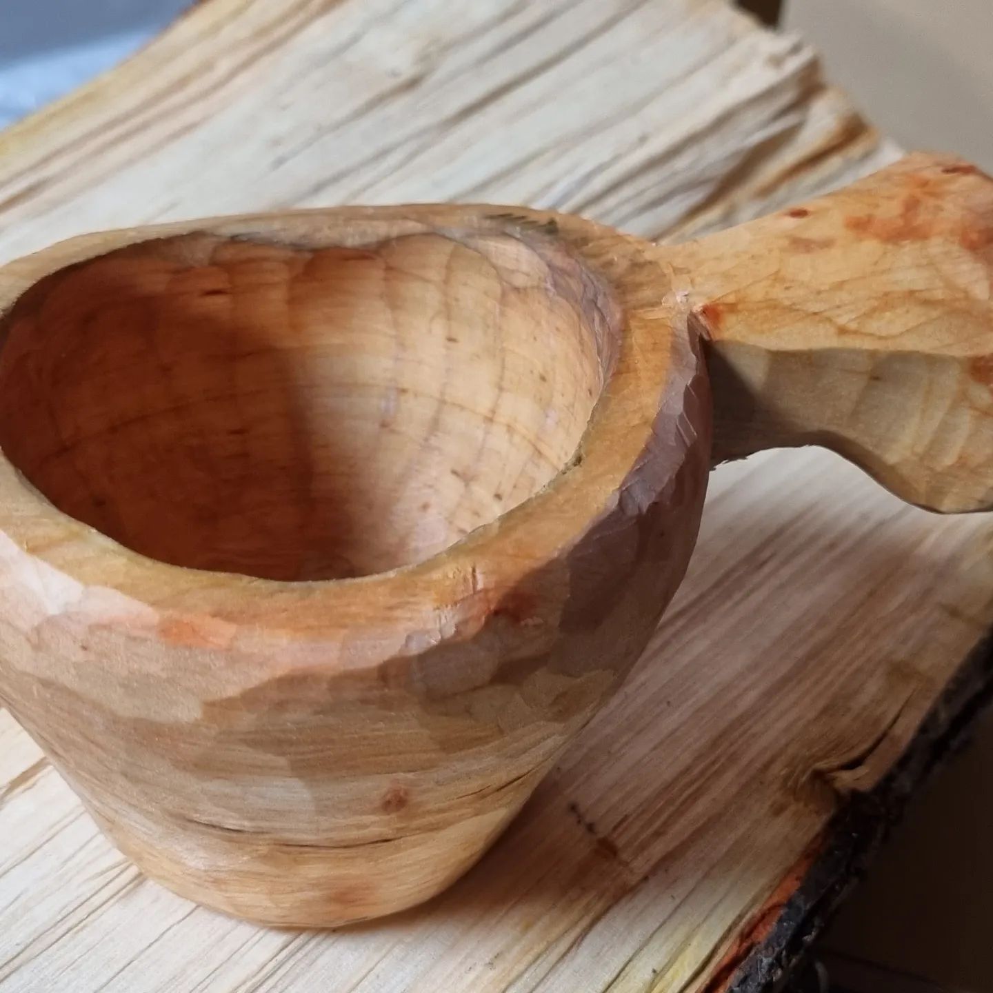 carved wood cup with handle
