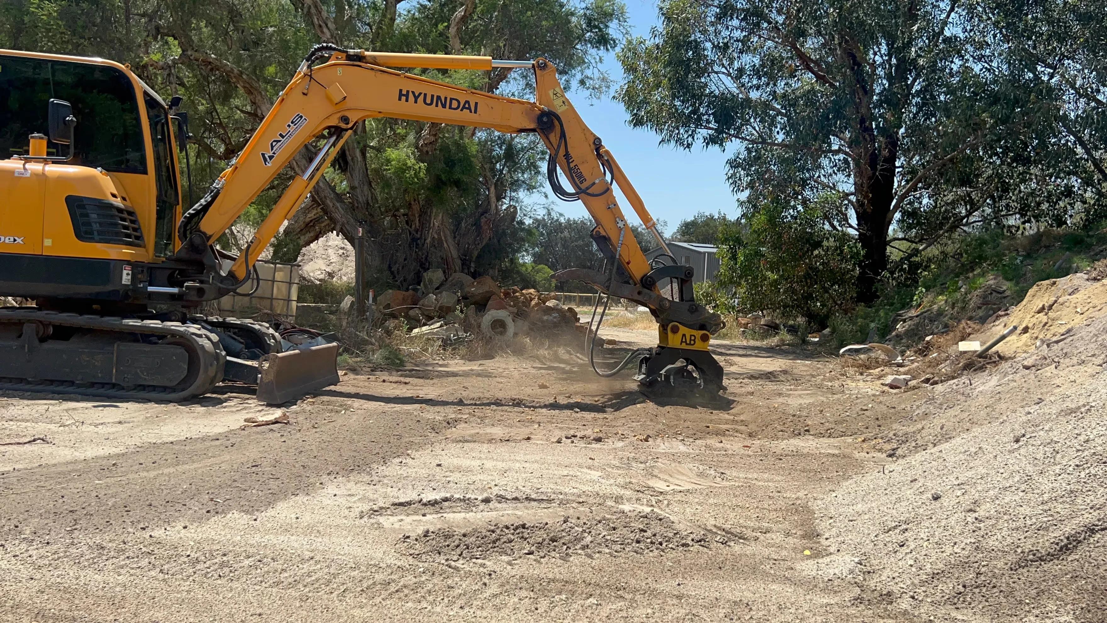 Aussie Buckets Vibrating Compaction Plate in action 3