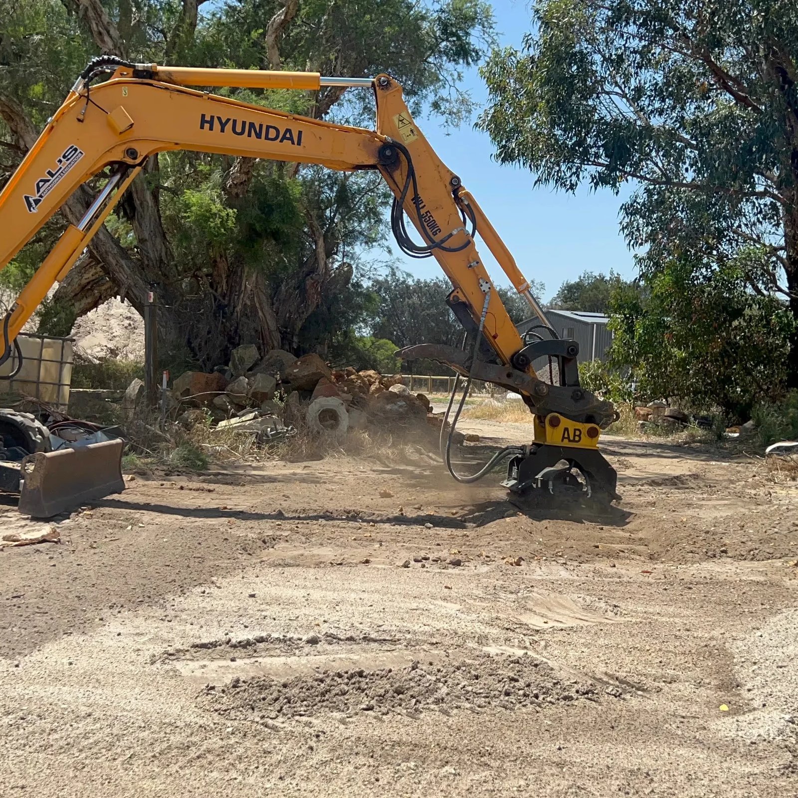 Aussie Buckets Vibrating Compaction Plate in action 3
