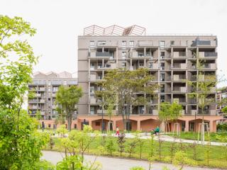 Residential Quarter Red Emma  Timber hybrid & social living in Vienna