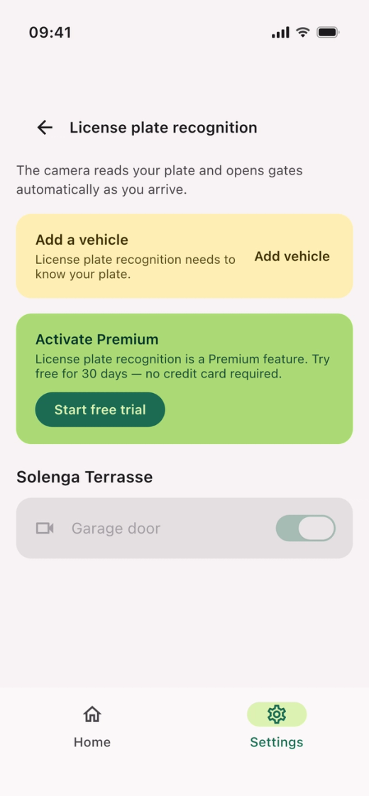 The “License plate recognition” screen, with the “Add a vehicle” and “Activate Premium” cards and the switch for “Garage door”