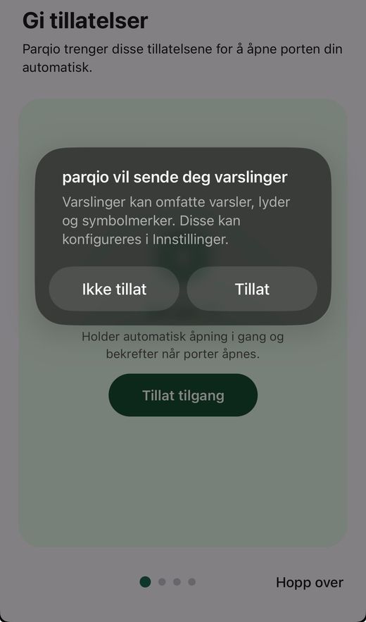iOS-dialogen «parqio vil sende deg varslinger» med knappene «Ikke tillat» og «Tillat» over «Gi tillatelser»