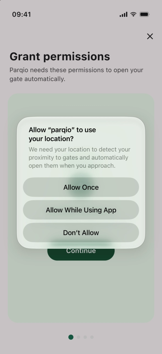 The iPhone asks whether Parqio may use your location, with “Allow Once”, “Allow While Using App” and “Don’t Allow”