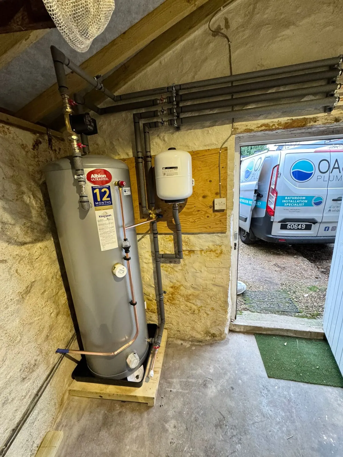 Boiler image with oasis van parked outside