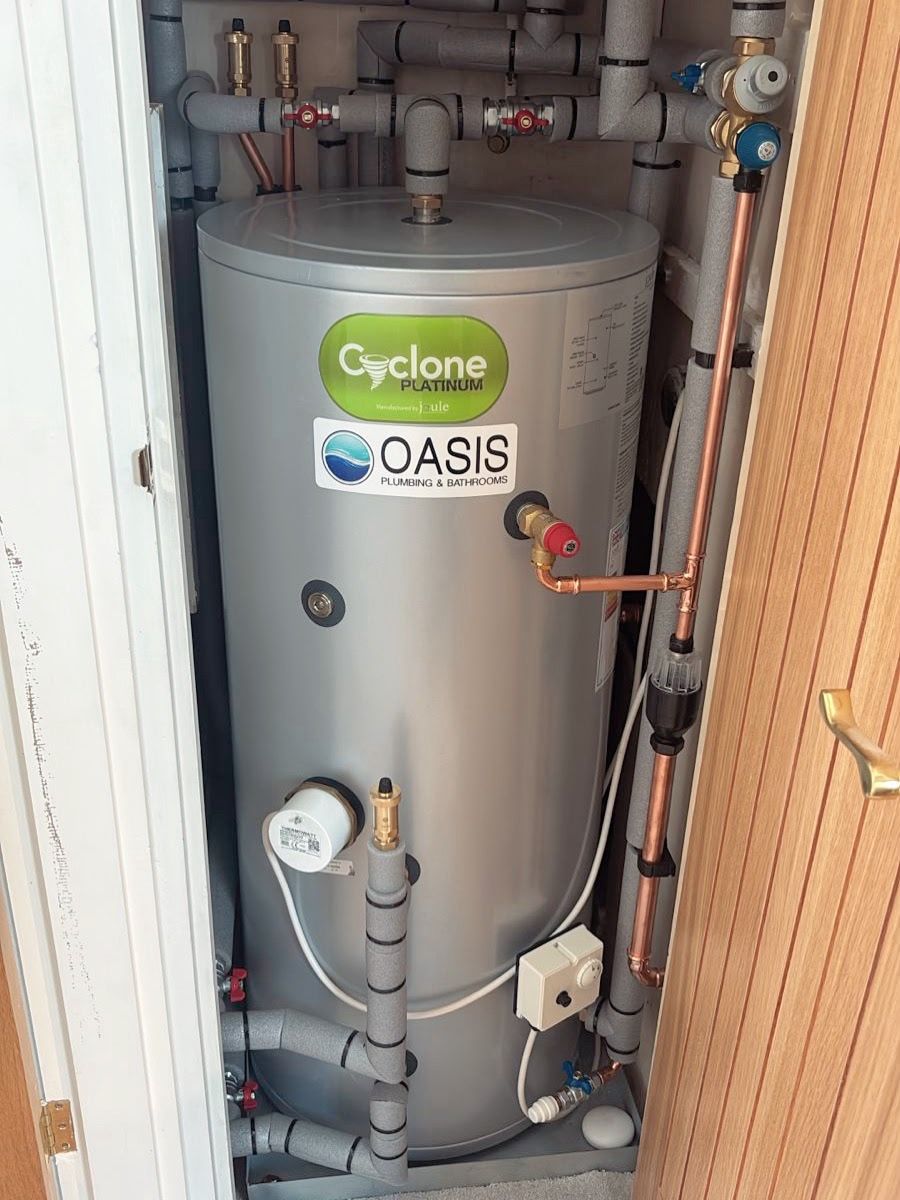 Hot water cylinder with Oasis logo