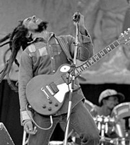 What are the political views and Religious Beliefs of Bob Marley? - Hollowverse