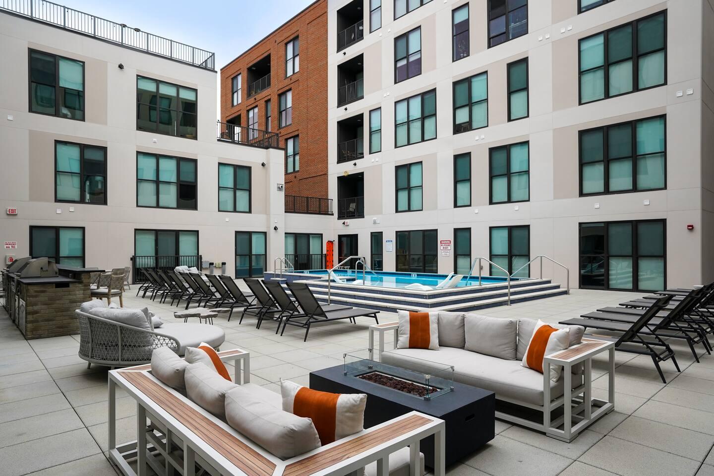 Outdoor: patio adorned with a refreshing pool, comfortable furniture, invites relaxation and leisure in a stylish outdoor retreat.