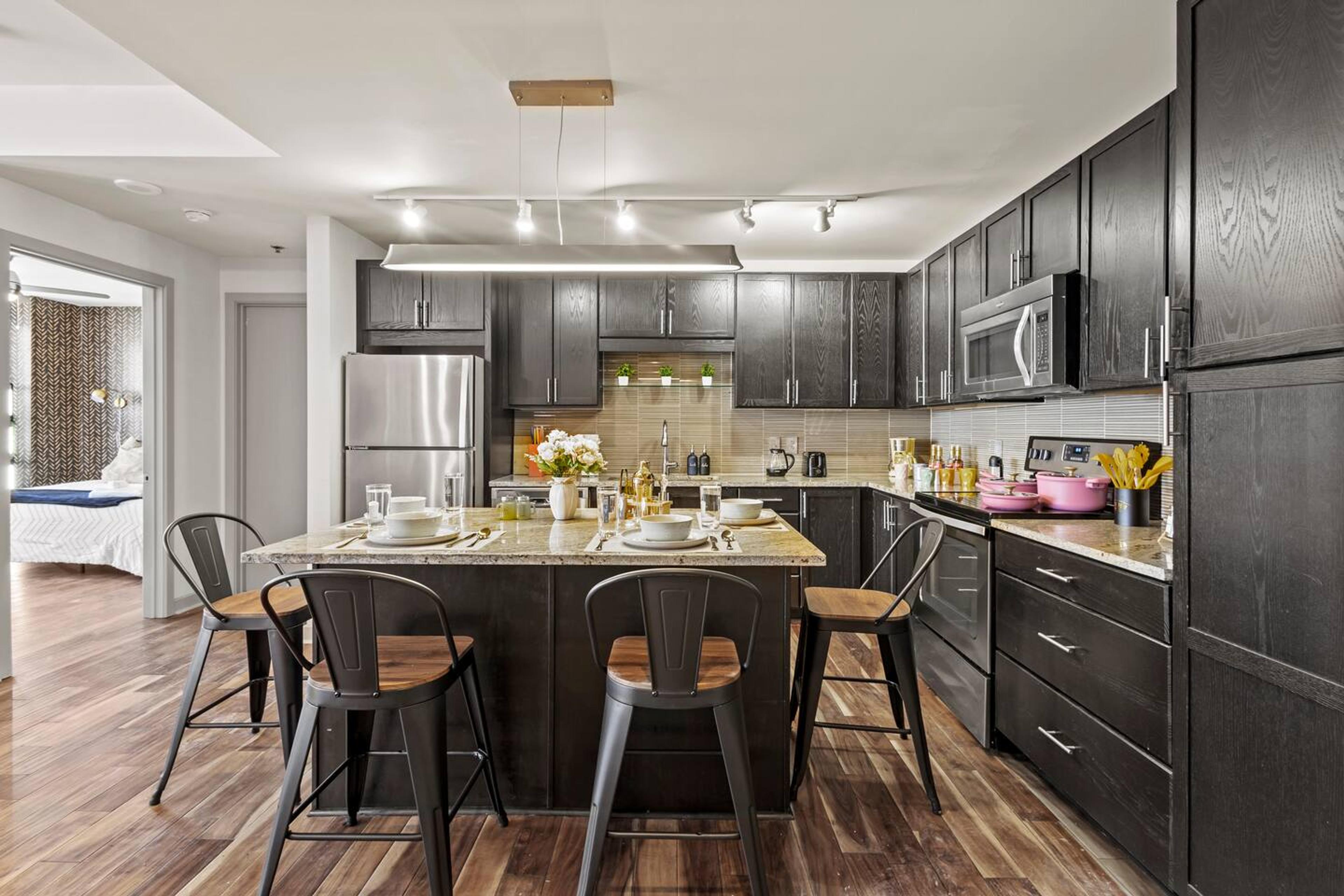 Kitchen & Dining Area
Spacious dining area and fully equipped kitchen with all essentials for cooking and enjoying meals.