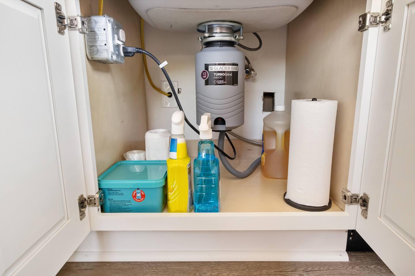 Sparkling clean and ready for action! Our kitchen is stocked with all the essential cleaning items to keep everything tidy and fresh.