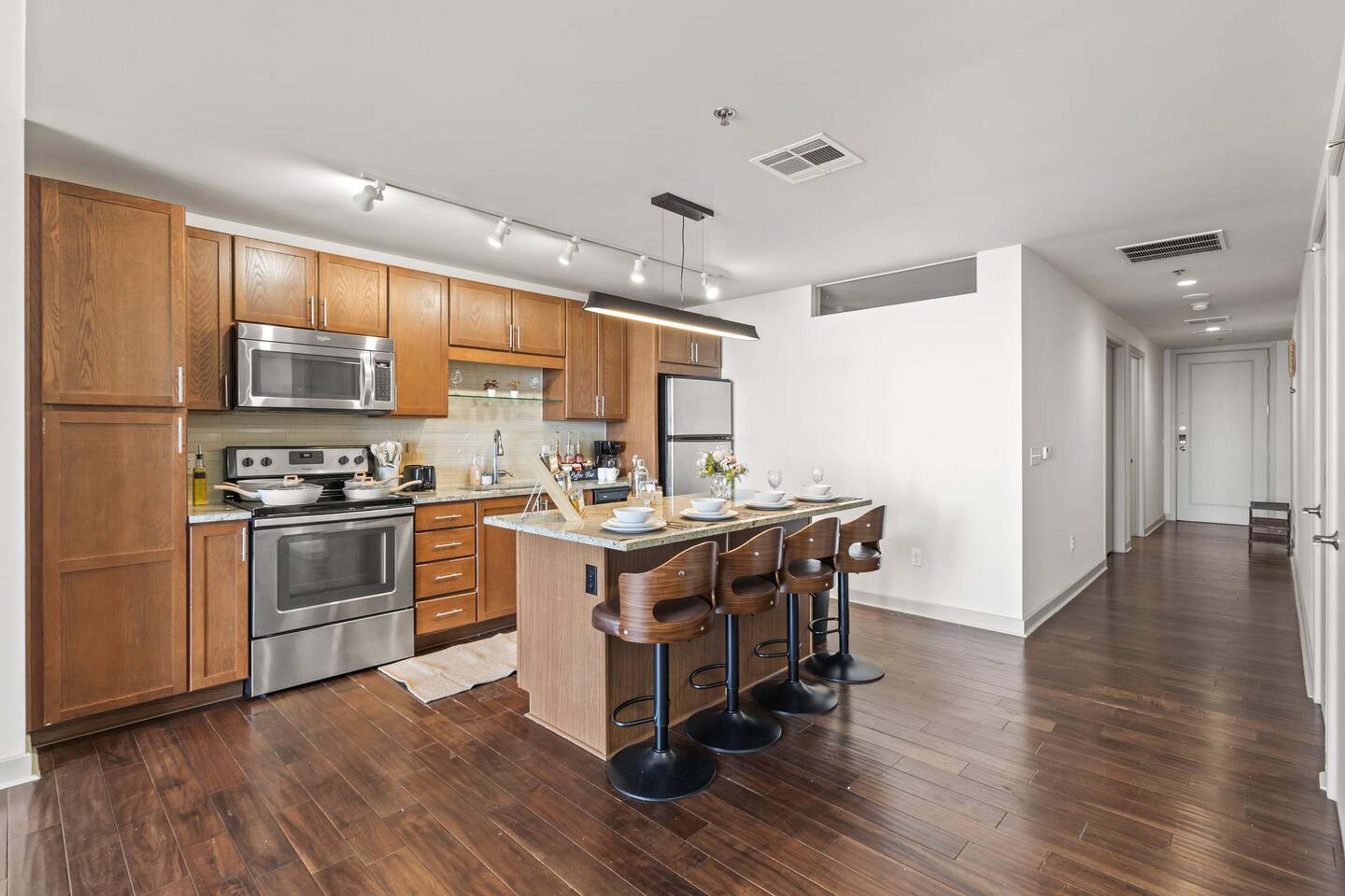 Kitchen
Fully equipped kitchen with microwave, stove, oven, refrigerator/freezer, dishwasher, toaster, sink with hot & cold water, trays, glasses, coffee, sugar, salt, olive oil, spices, silverware, pots and pans, coffee maker with essentials & more