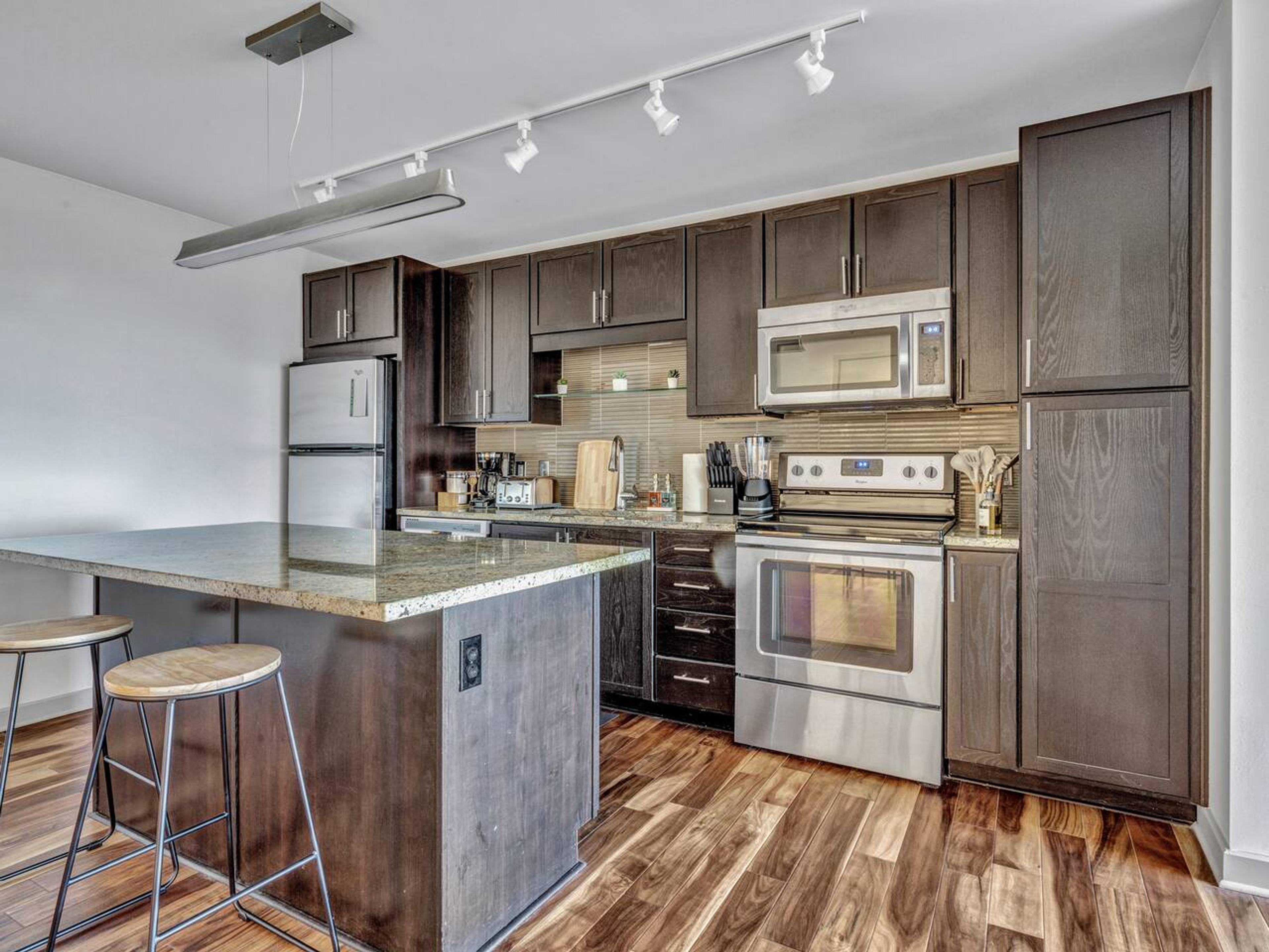 Kitchen and dining: Revel in the aesthetic delights of this stunning kitchen with a gorgeous countertop. Dine with your family in this brand-new kitchen and yes we have a high chair for our little guests too.