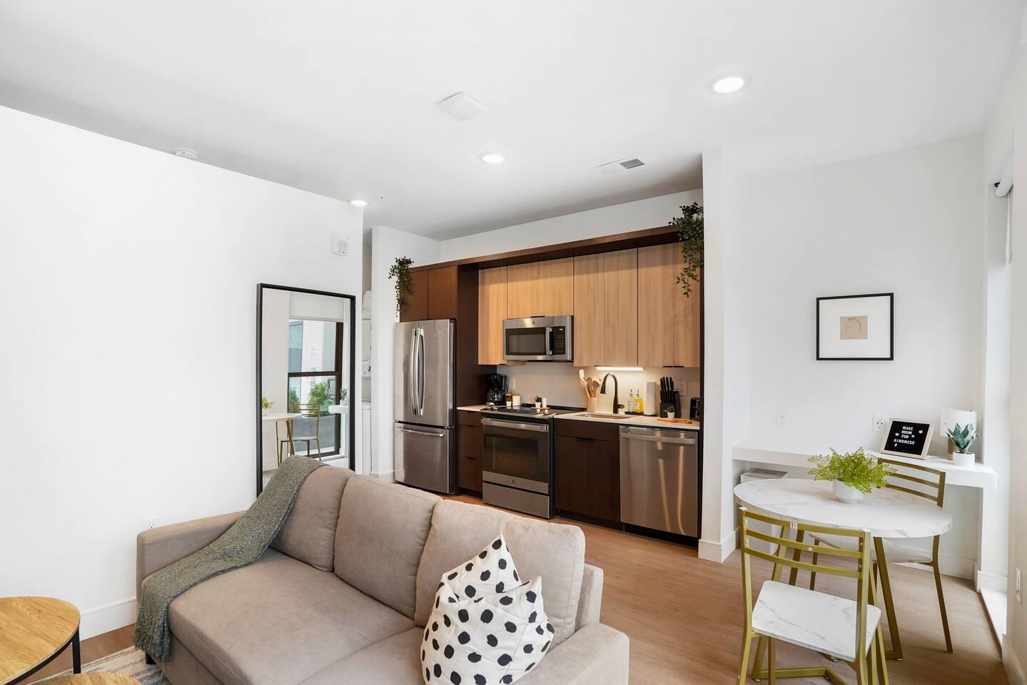 A complete picture with a view of living room, dining area and the kitchen.