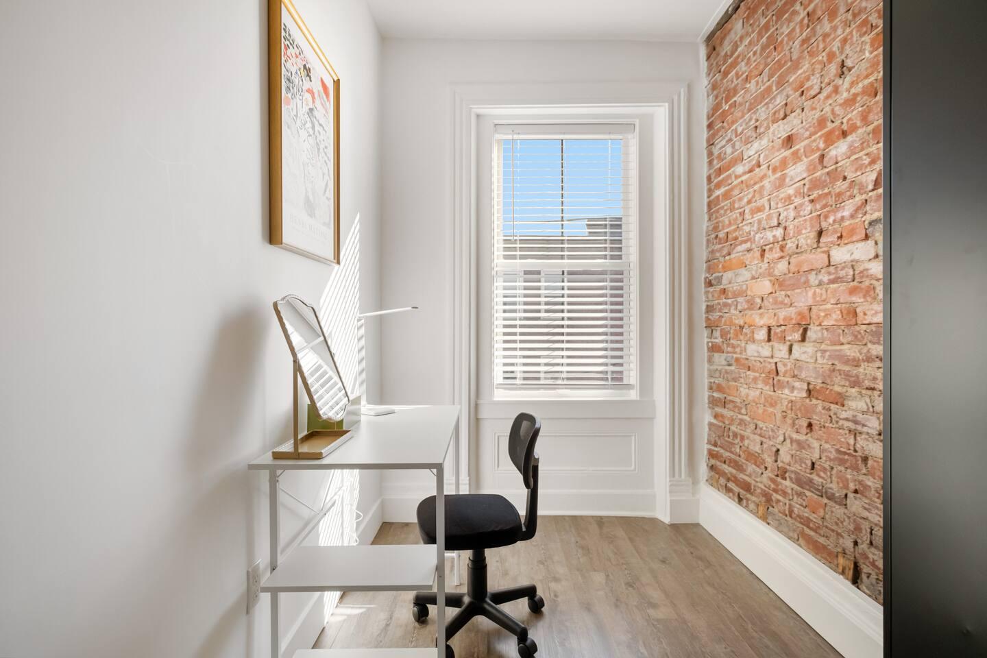 Private work space with a monitor.