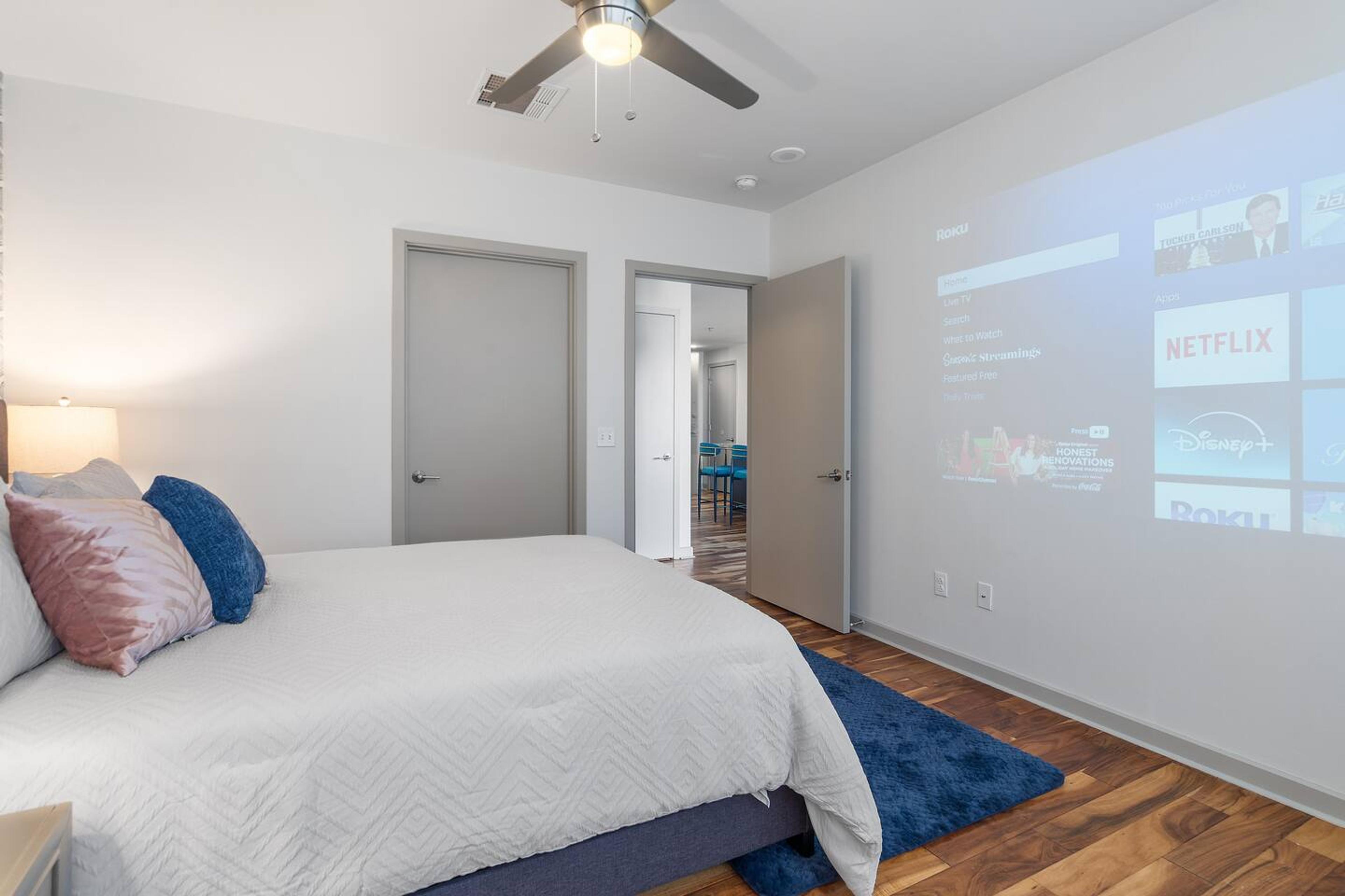 Bedroom area with a projector