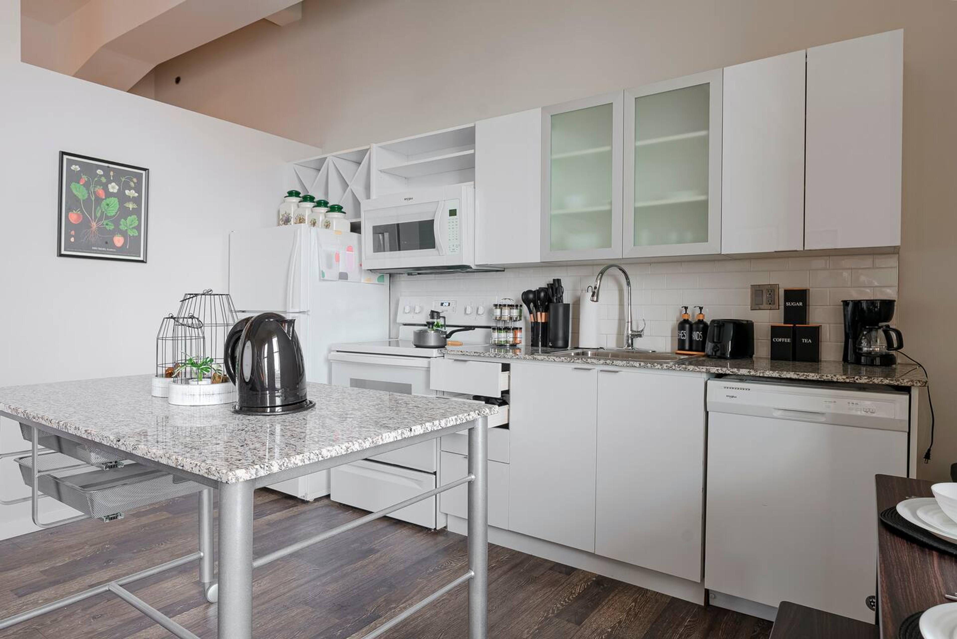 A cute little kitchen, I kept with every essentials that a guest would need for the brief stay. It also has pants and pots just in case if you decide to cook and enjoy your day.