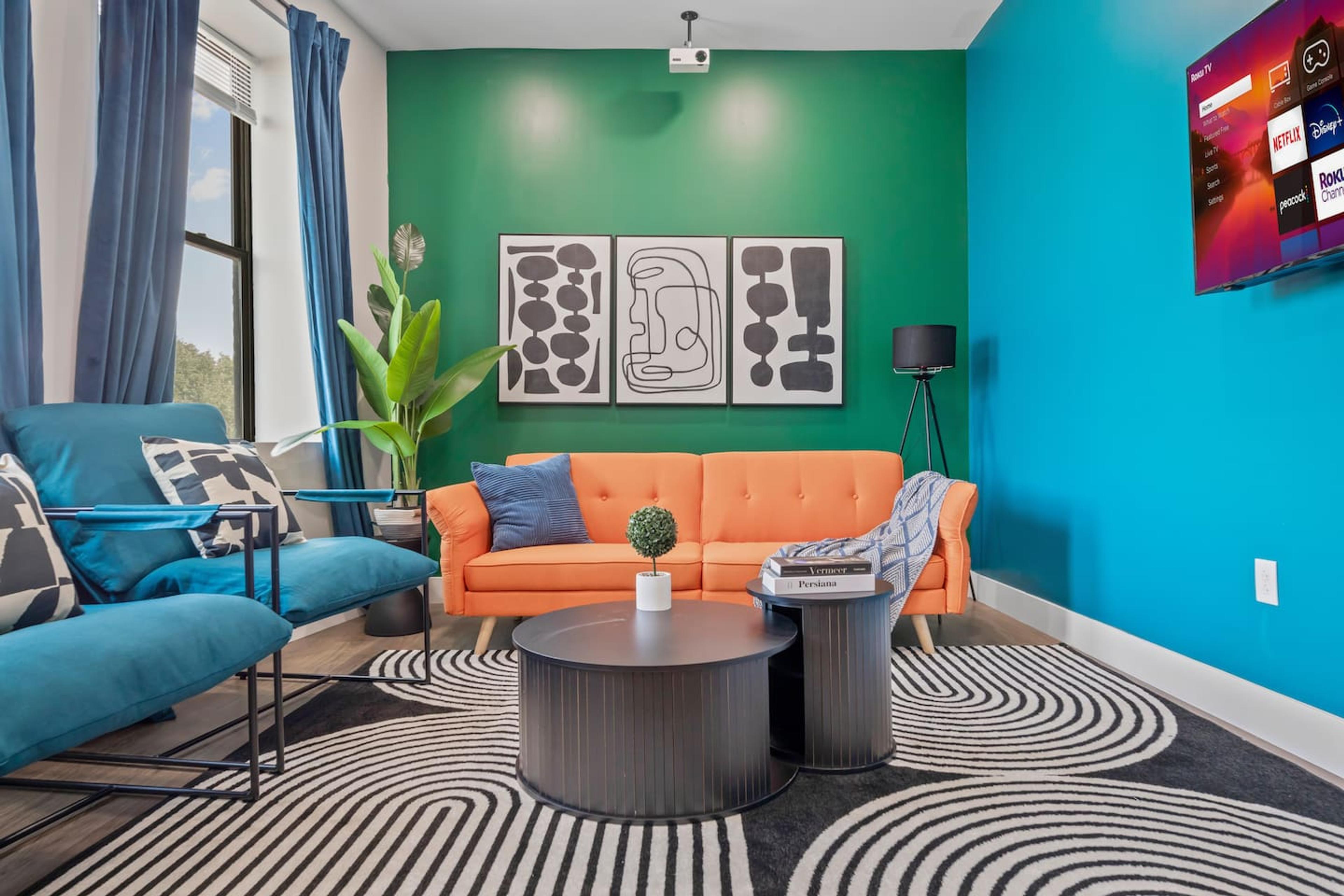 Stunning and vibrant lifestyle guarantee. This living space is careful designed with comfort and luxury in mind. The living includes : Couch with protector, accent chairs, center table on cozy carpet, high speed WiFi , a Roku TV + Projector.