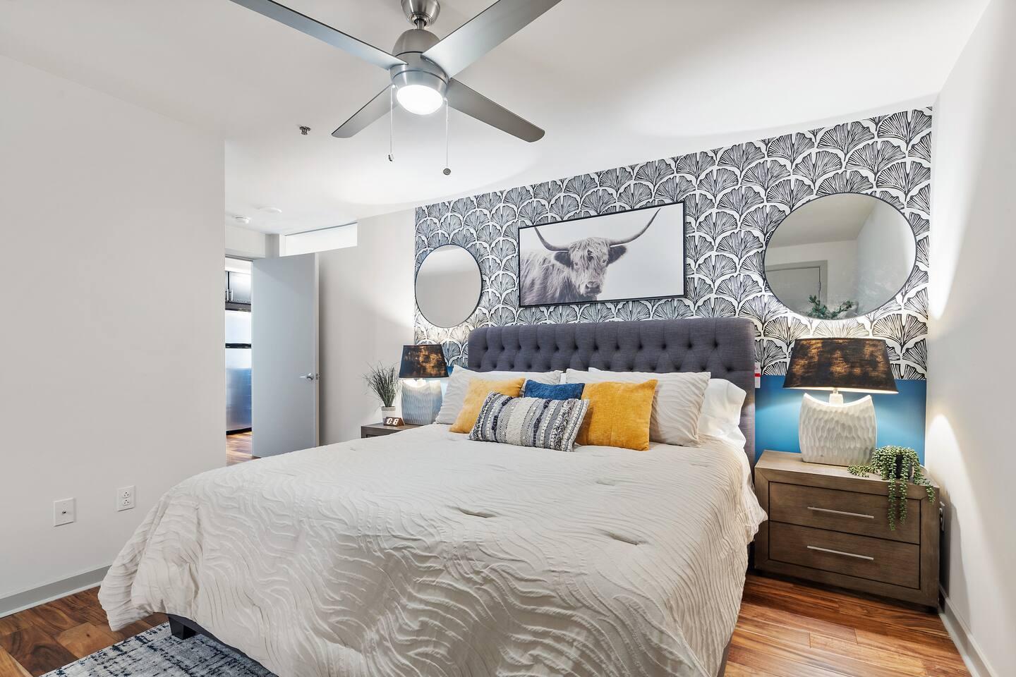 A Perfect cute spacious bedroom with one king bed that sleeps 2 adults. Designed with with comfort in mind and equipped with memory foam mattress, Cozy bedroom with nightstands