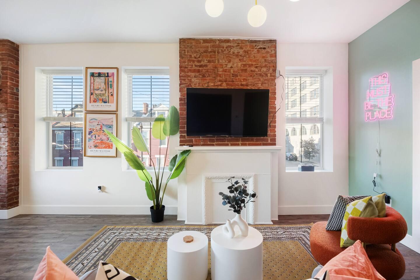Cozy Living Room with a Large Smart TV for Your Entertainment! ✨