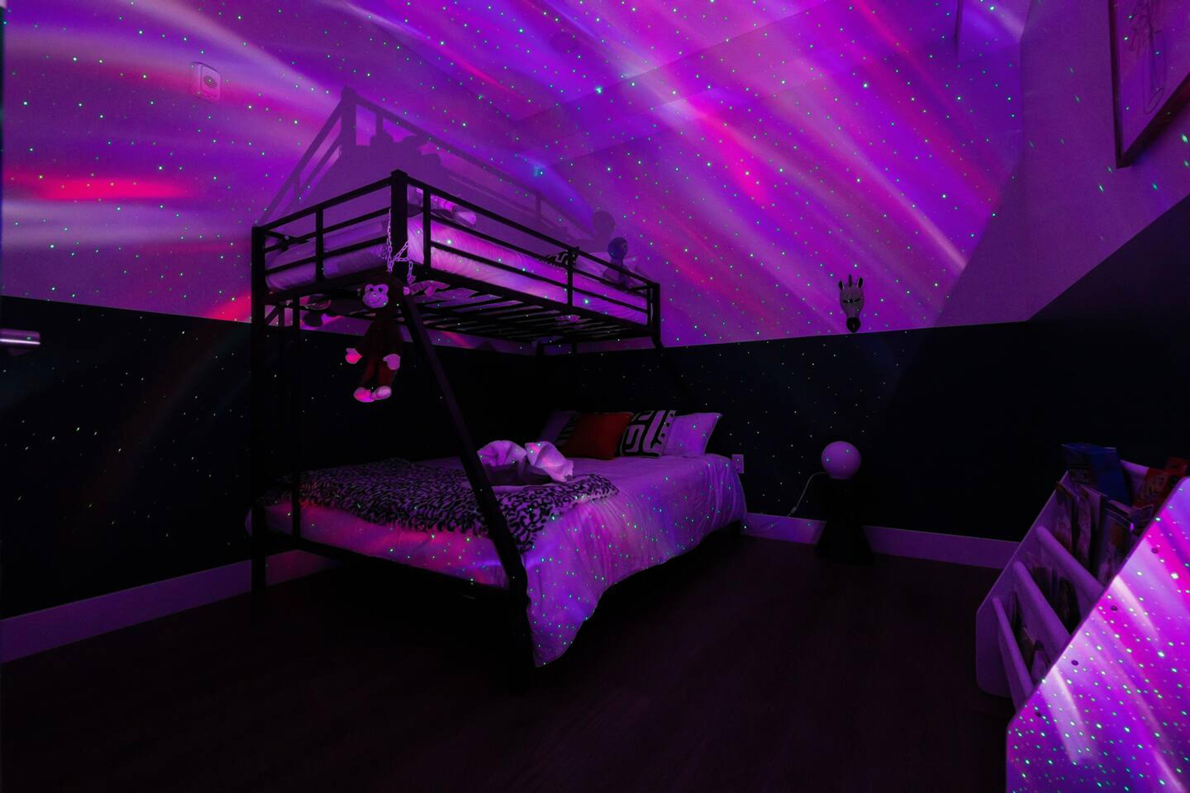 Bedroom 2: Bunk bed with Twin XL over Kind size bed. 
Has: AC, books for kids, games, night light , blanket, pillows and night lamp.