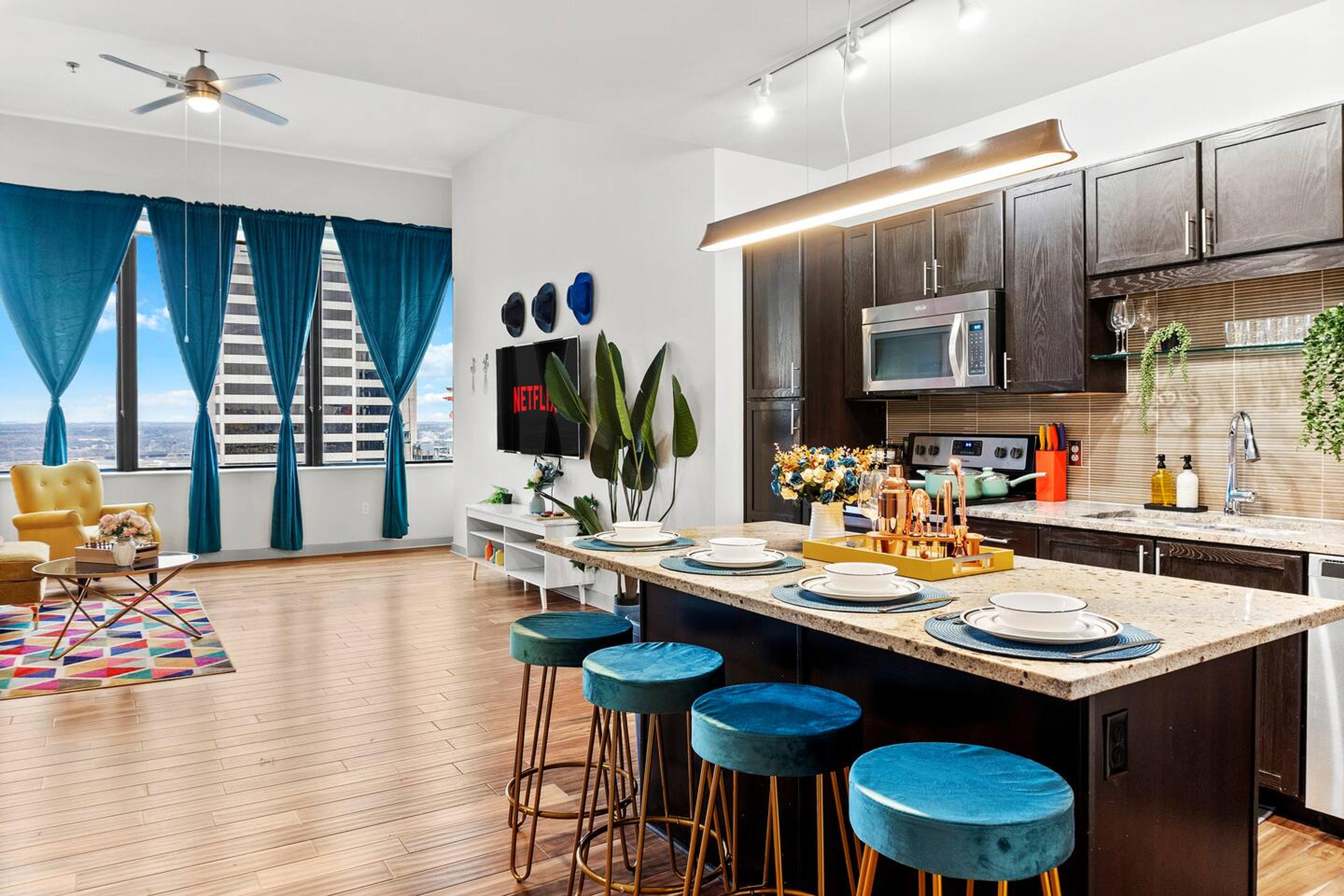 Fully equipped Kitchen: Kettle, knife set, coffee maker, cutting board, blender, electric stove, microwave, oven, spatulas, whiskers, toaster, stainless steel appliances and also fully stocked cabinets with cleaning amenities.