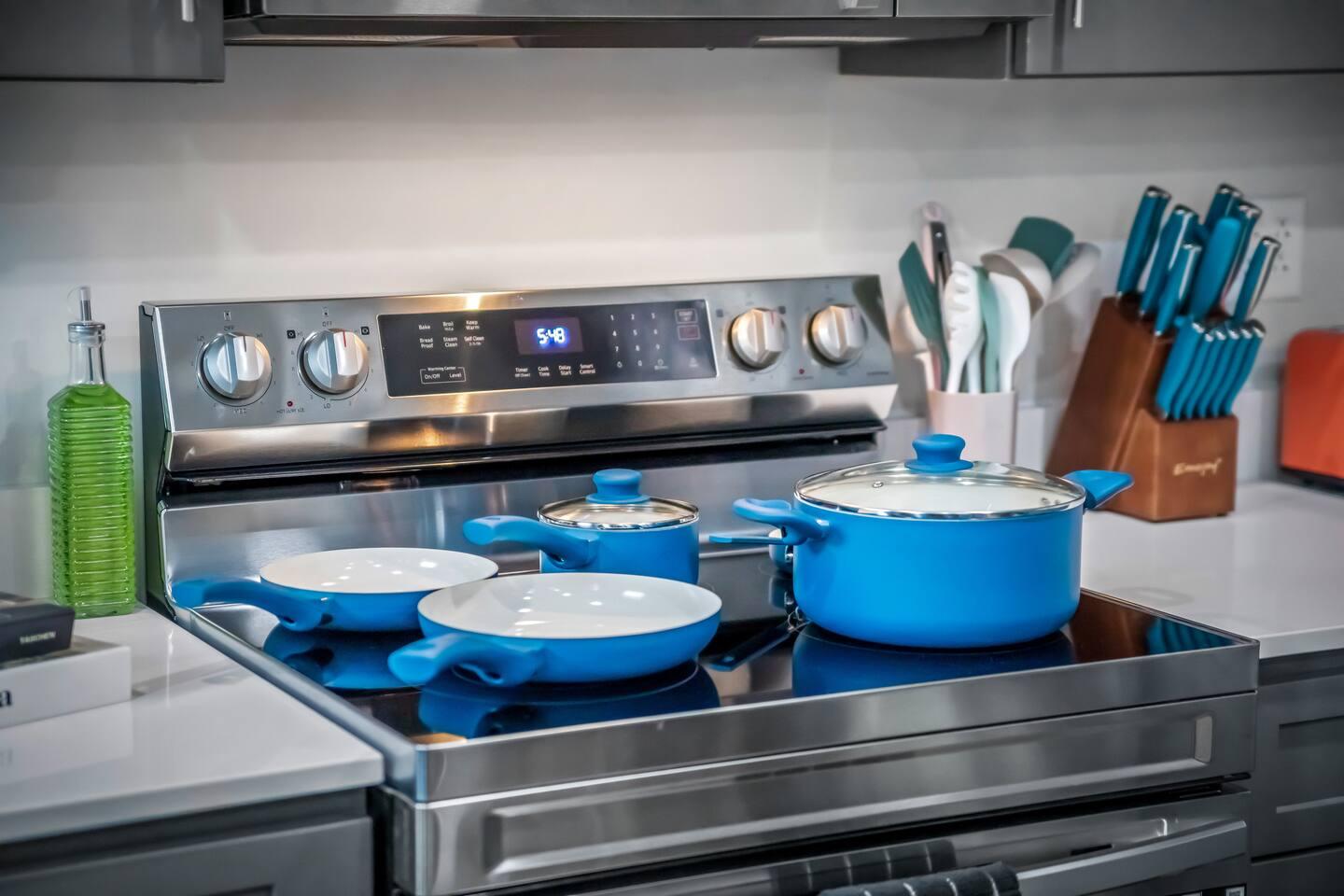 Kitchen: Electric stove, pots and pans, oil ,spice rach , bagel / bread toaster, knife set