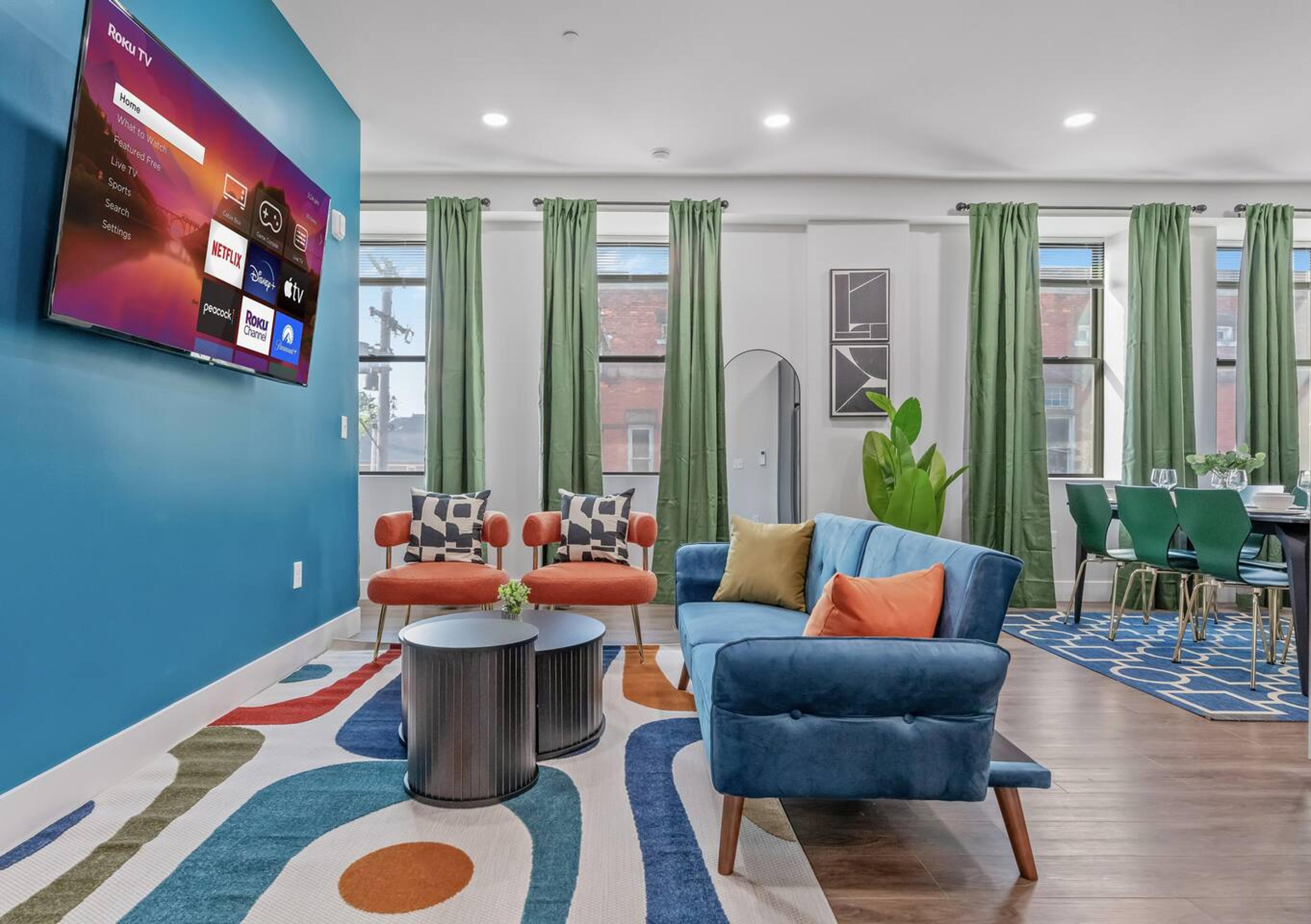 Stunning and vibrant lifestyle guarantee. This living space is careful designed with comfort and luxury in mind. The living includes : Couch, accent chairs, center table on cozy carpet, high speed WiFi and a Roku TV 55" wall mounted.