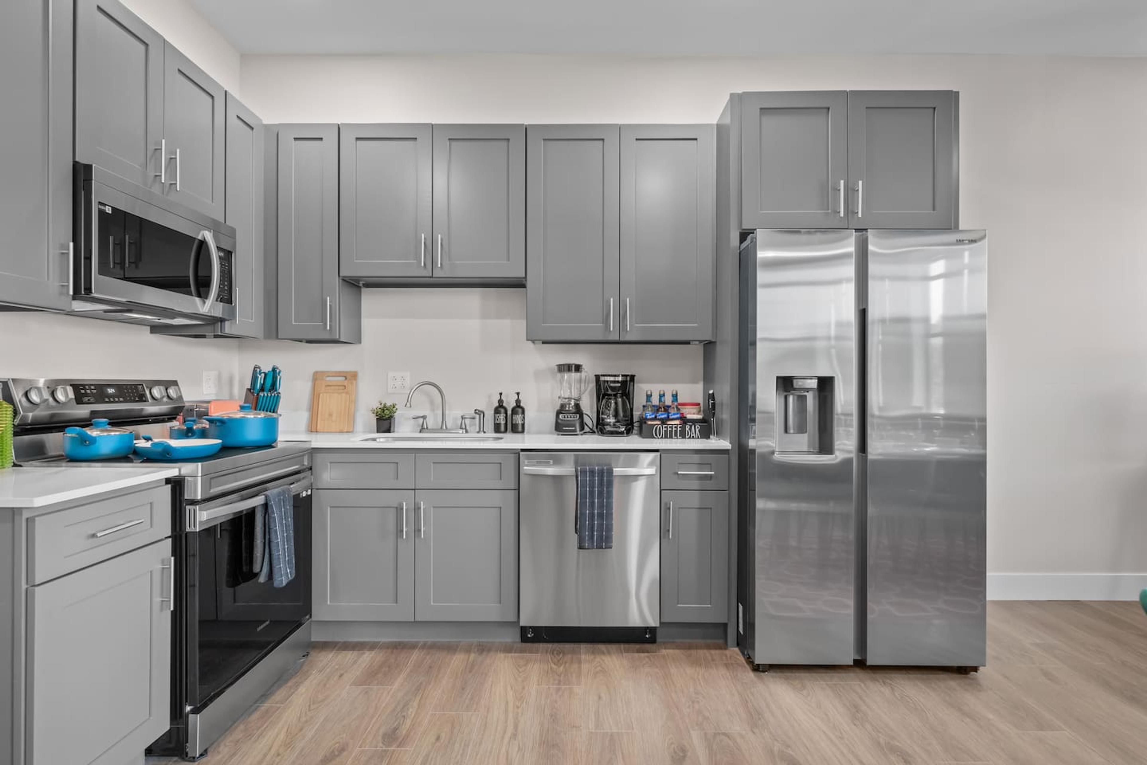 Fully upgraded kitchen with stainless steel appliances : Double door fridge with water dispenser, microwave, stove , dishwasher and drinking water