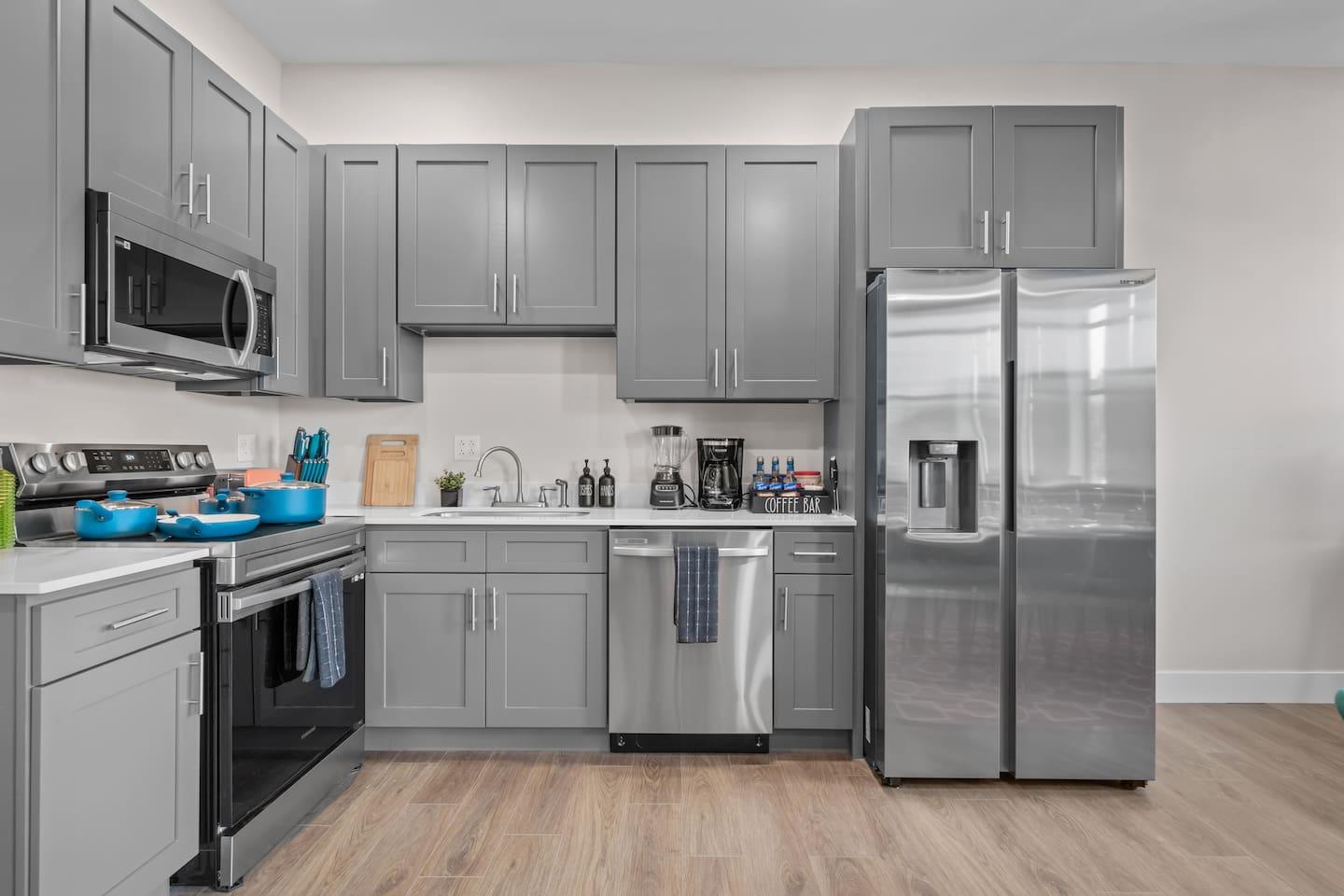 Fully upgraded kitchen with stainless steel appliances : Double door fridge with water dispenser, microwave, stove , dishwasher and drinking water