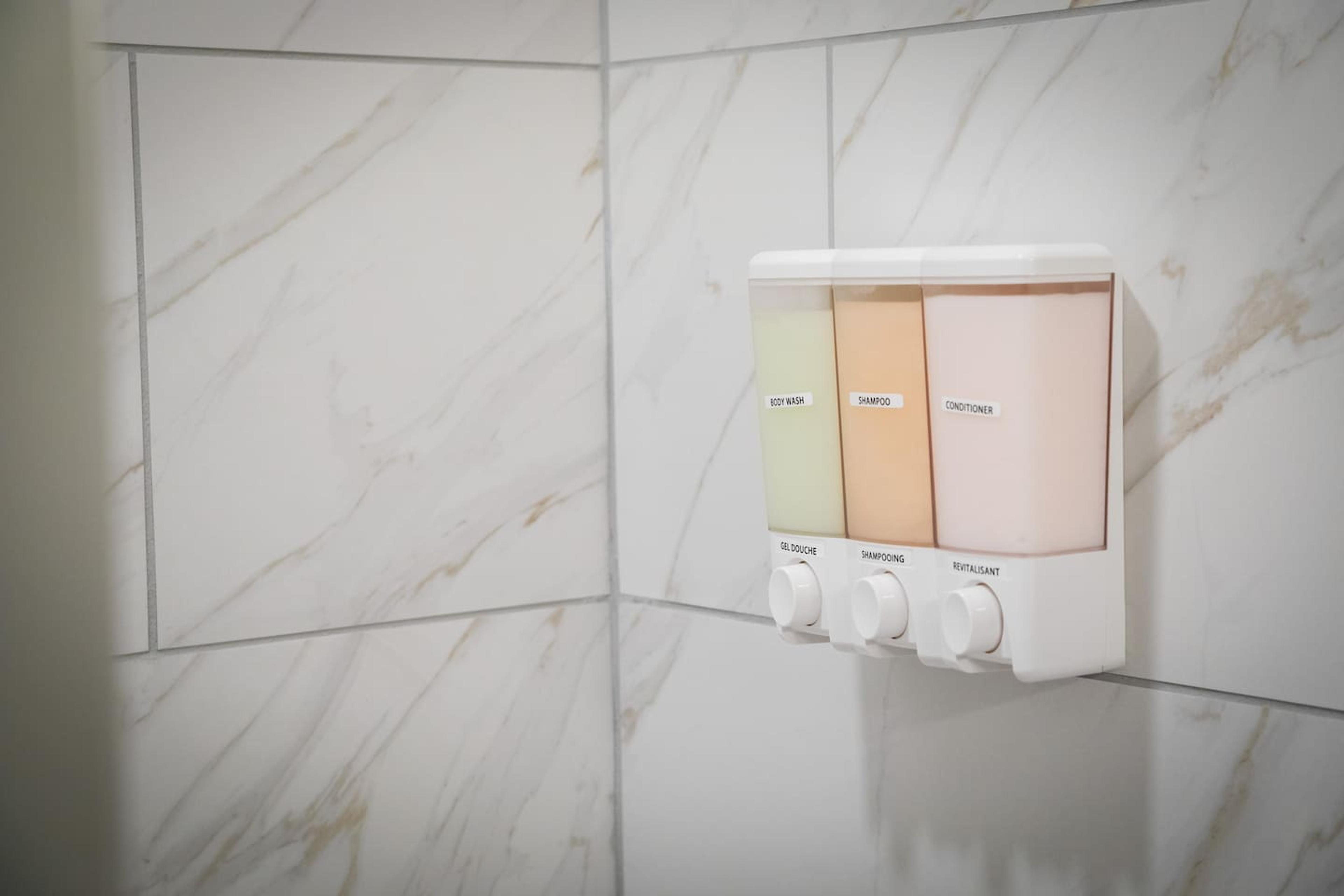 Bathroom: Soap, Shampoo and conditioner dispenser