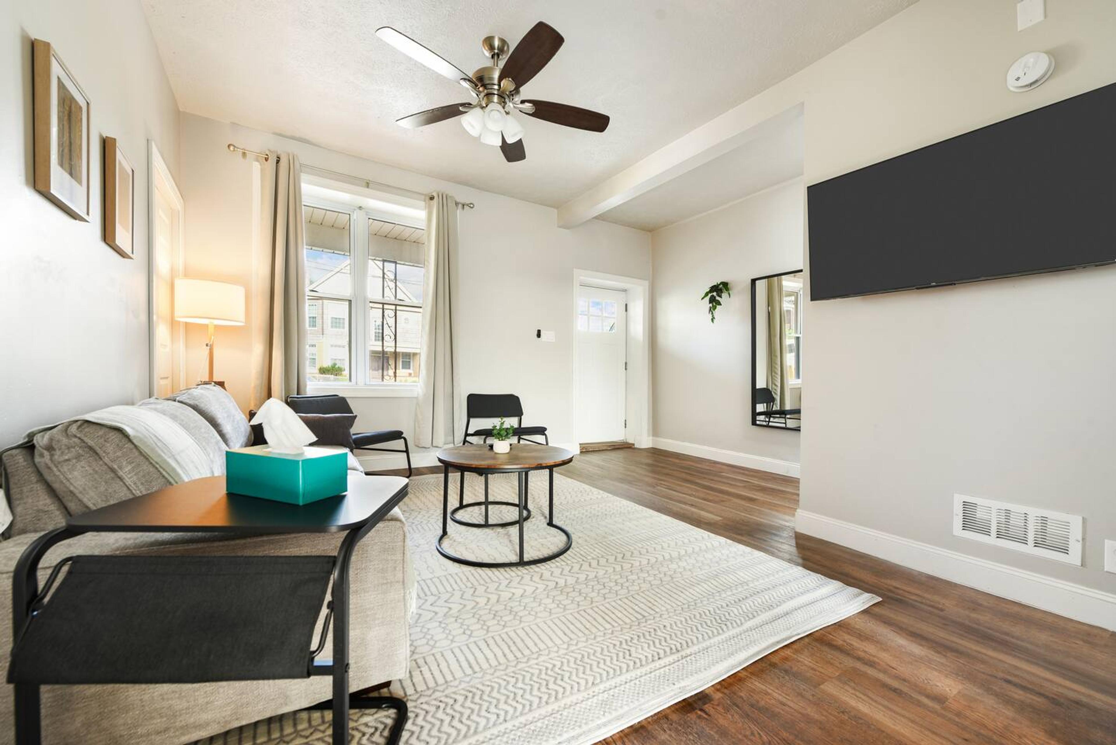 Living room : 
A Perfect Blend of Natural Light, Cozy Lamps, and Entertainment Delight