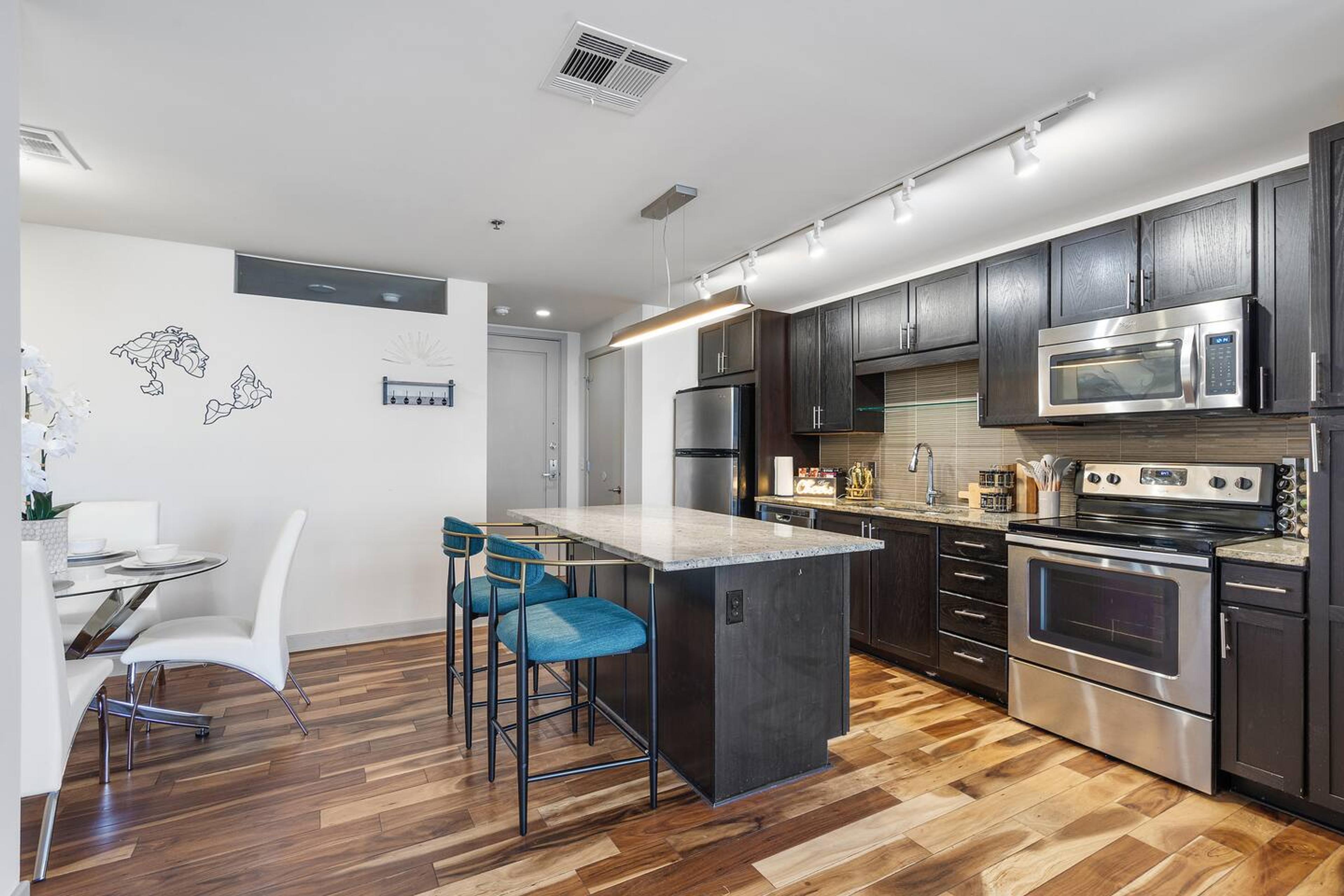 A wide and simple kitchen to satiate your hunger.