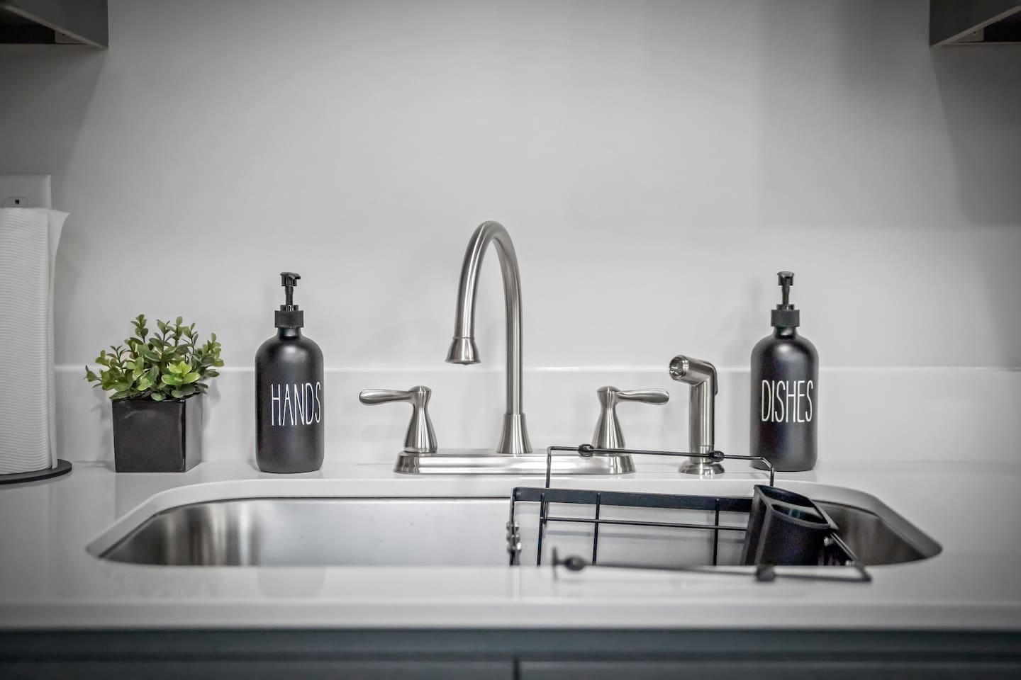 Wash basin with liquids for washing hands and dishes.