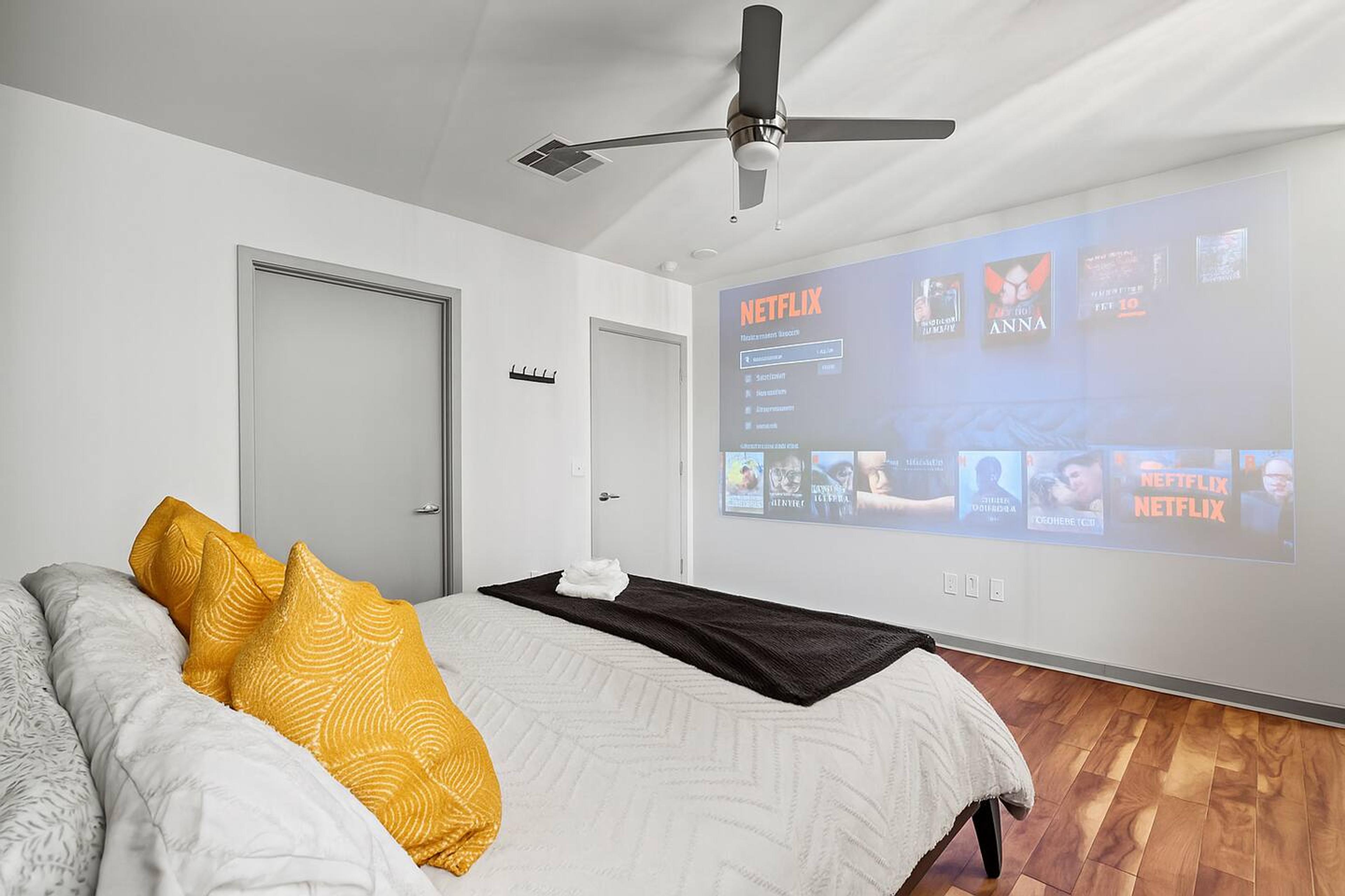 Bedroom
Spacious room with a king-size bed, premium linens, and a movie projector. Additional air mattress available for extra guests.