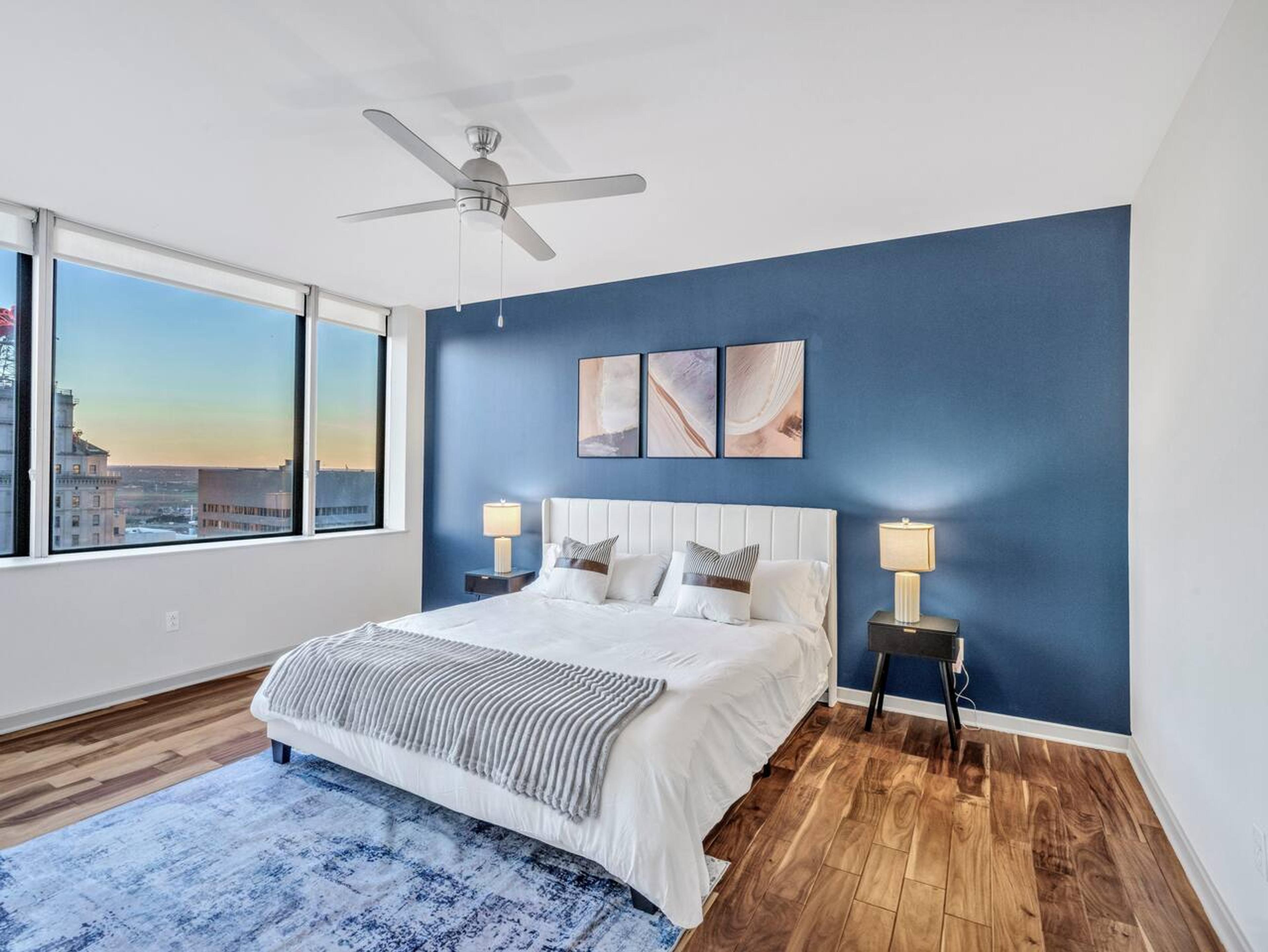 Large bedroom with king size mattress with a projector to enjoy movie night with your loved ones.