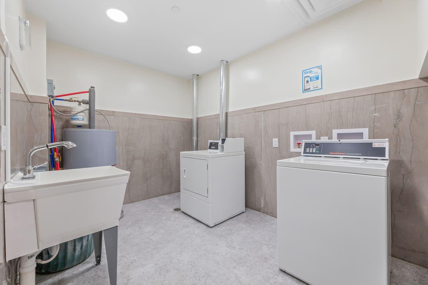 Shared Laundry located near the unit closer to the elevator.