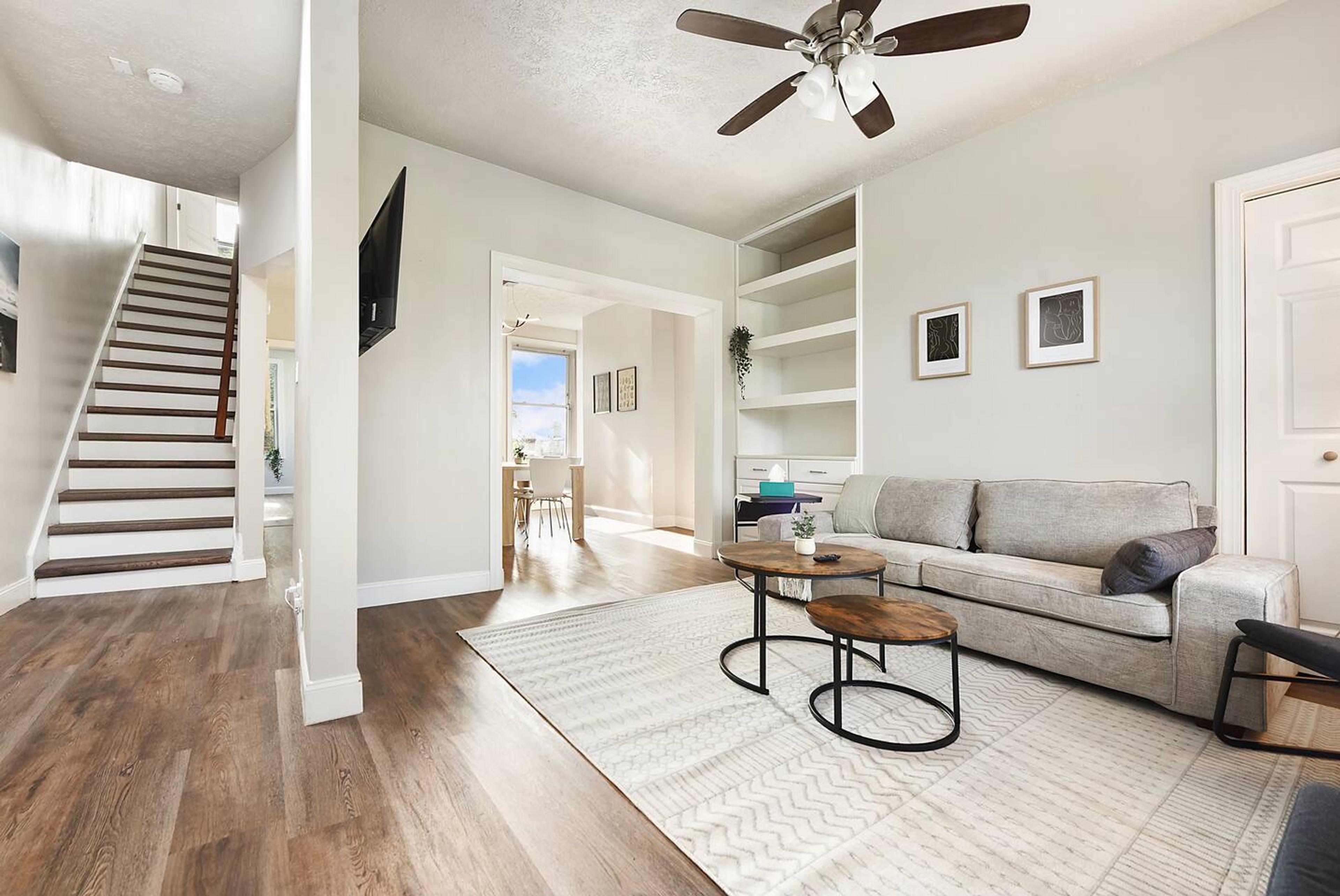 Where Every Step Leads to Comfort: A Living Room and Stairs That Define Home