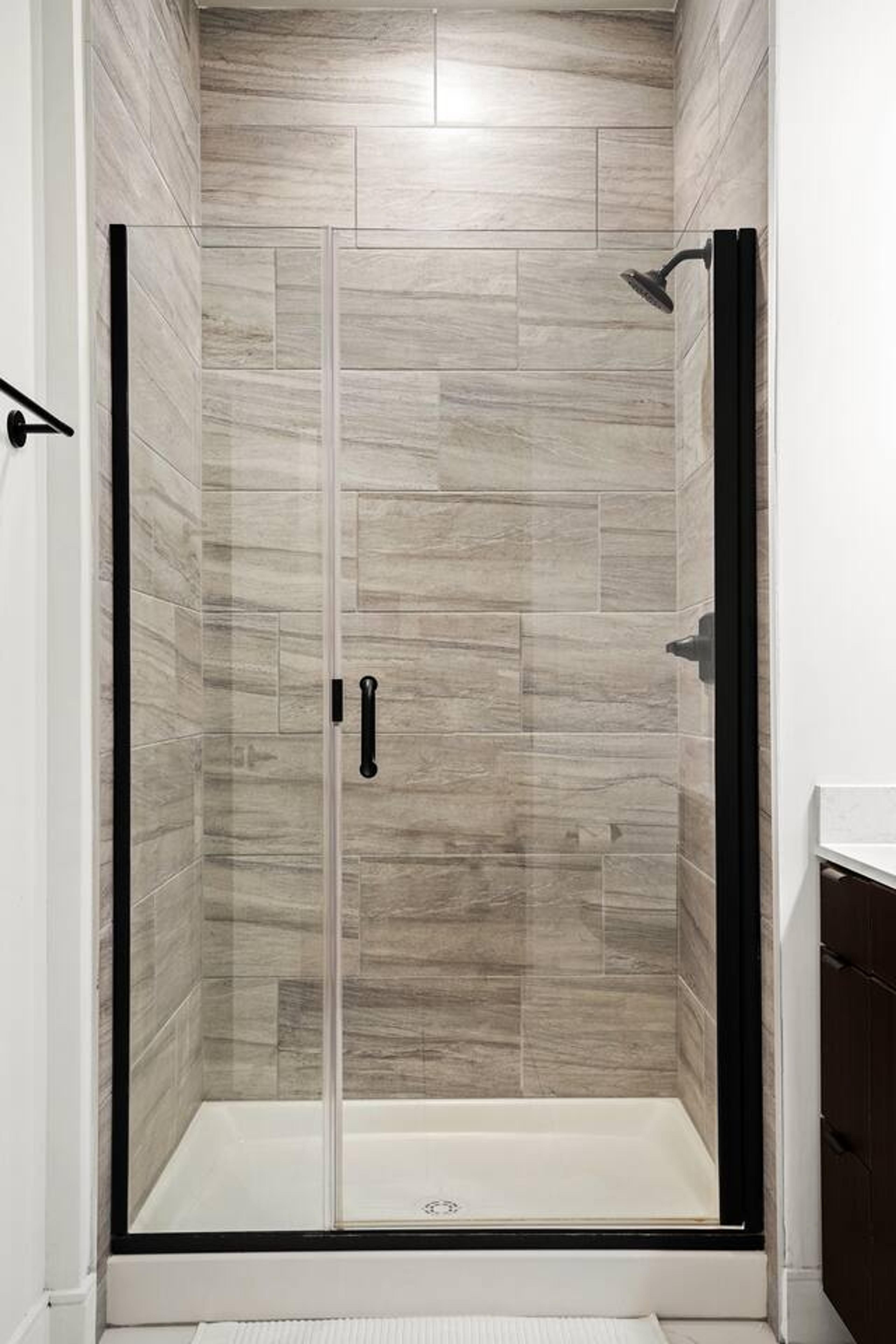 This bathroom has a shower which provides hot and cold water 24/7 which is a pleasure after an exhausting day .Also a toilet and an sink, it is clean and well maintained.