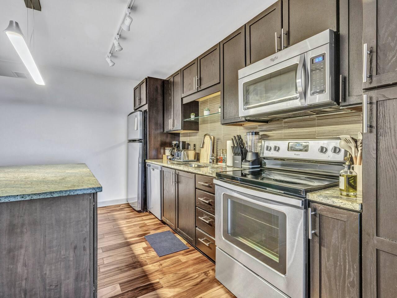 Fully stocked kitchen with all cooking amenities.