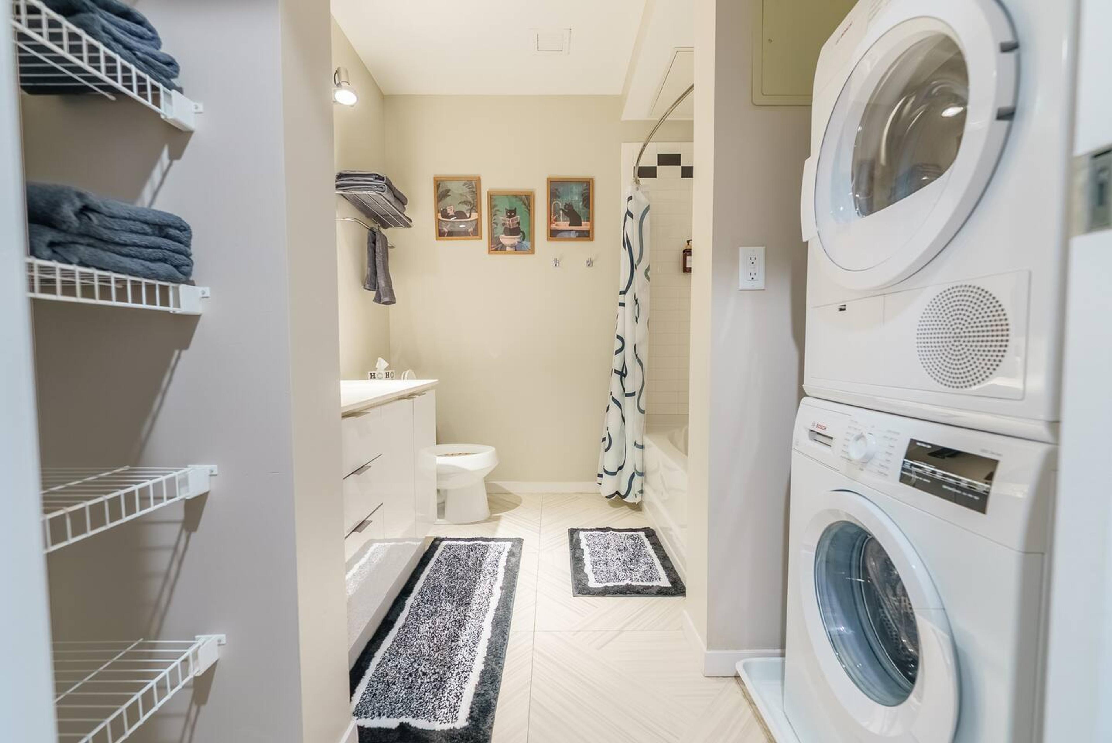 Laundry area equipped with washer and dryer for longer stays.