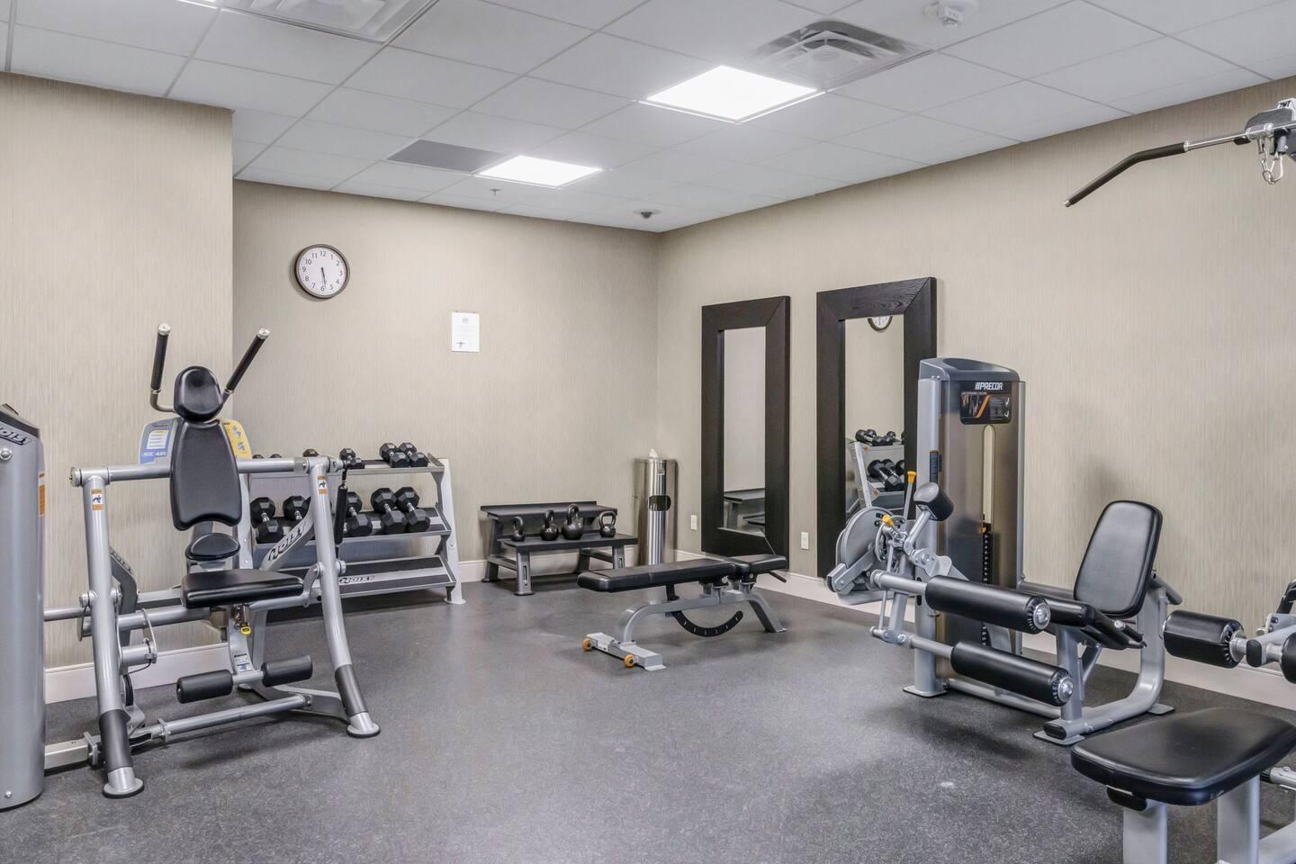 Common area: gym area with variety of equipment.