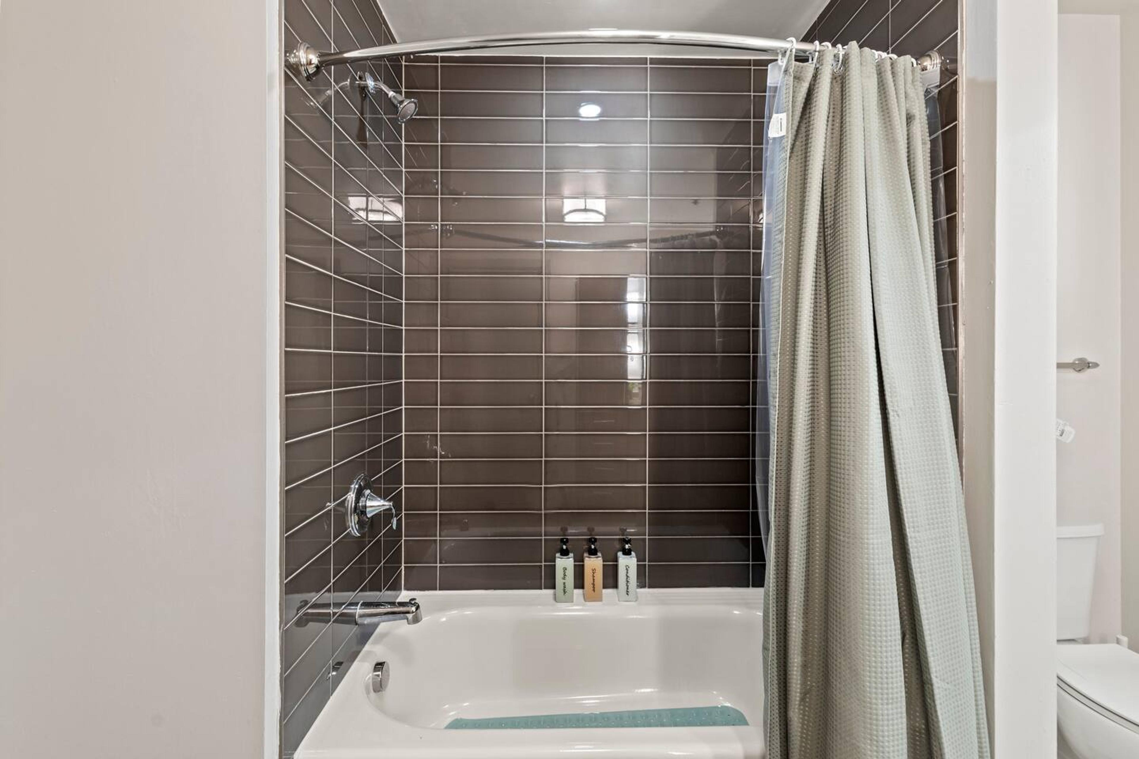 Bathroom : Elevate your daily routine in this immaculate bathroom with thoughtful essentials