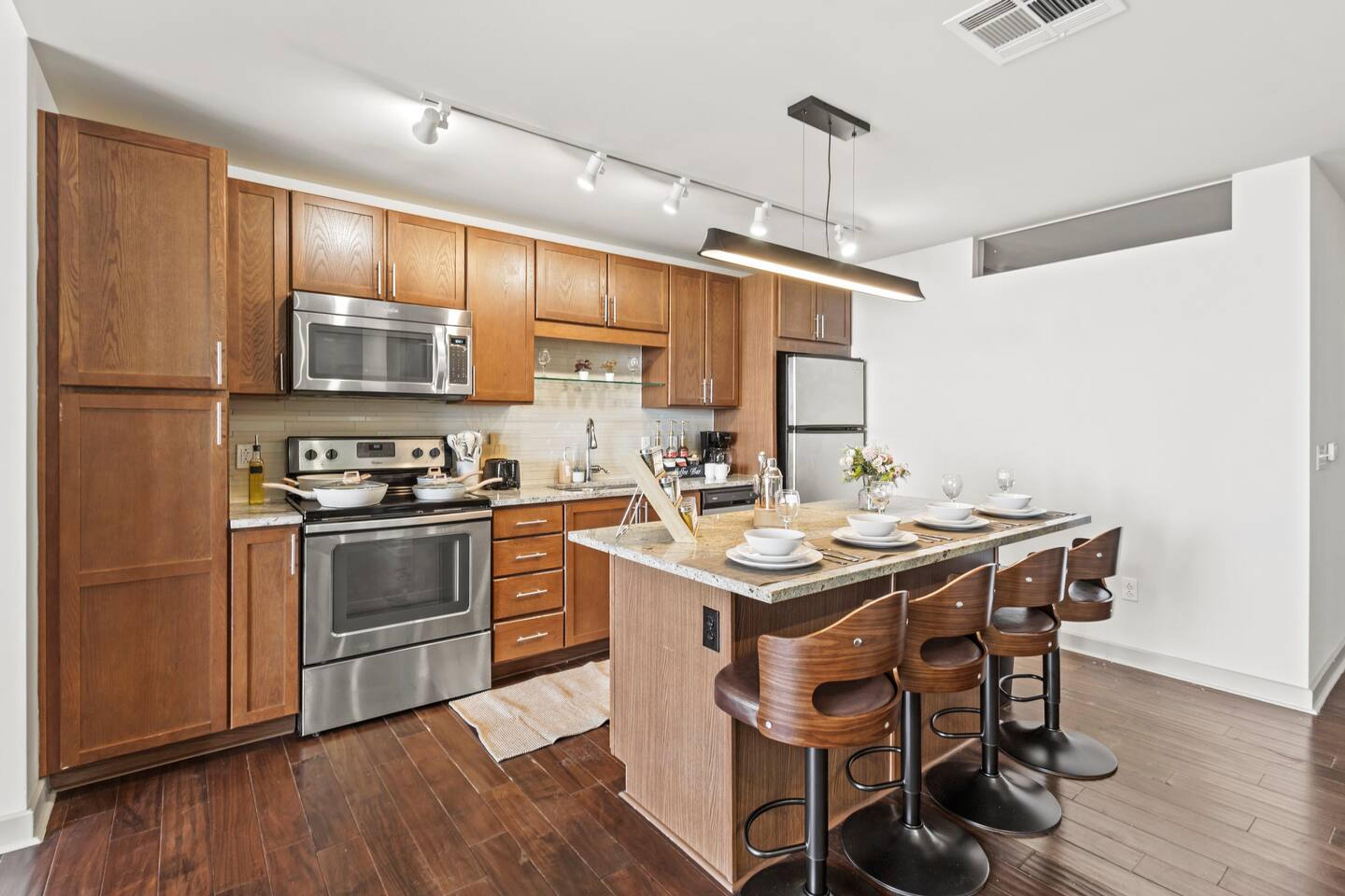 Kitchen
Fully equipped kitchen with microwave, stove, oven, refrigerator/freezer, dishwasher, toaster, sink with hot & cold water, trays, glasses, coffee, sugar, salt, olive oil, spices, silverware, pots and pans, coffee maker with essentials & more