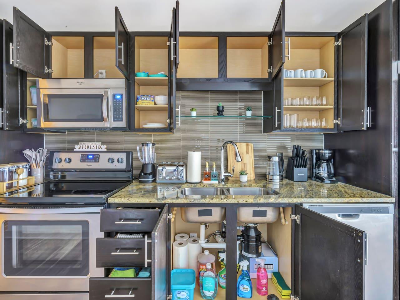 Fully equipped Kitchen: Kettle, knife set, coffee maker, cutting board, blender, electric stove, microwave, oven, spatulas, whiskers, toaster, stainless steel appliances and also fully stocked cabinets with cleaning amenities.
