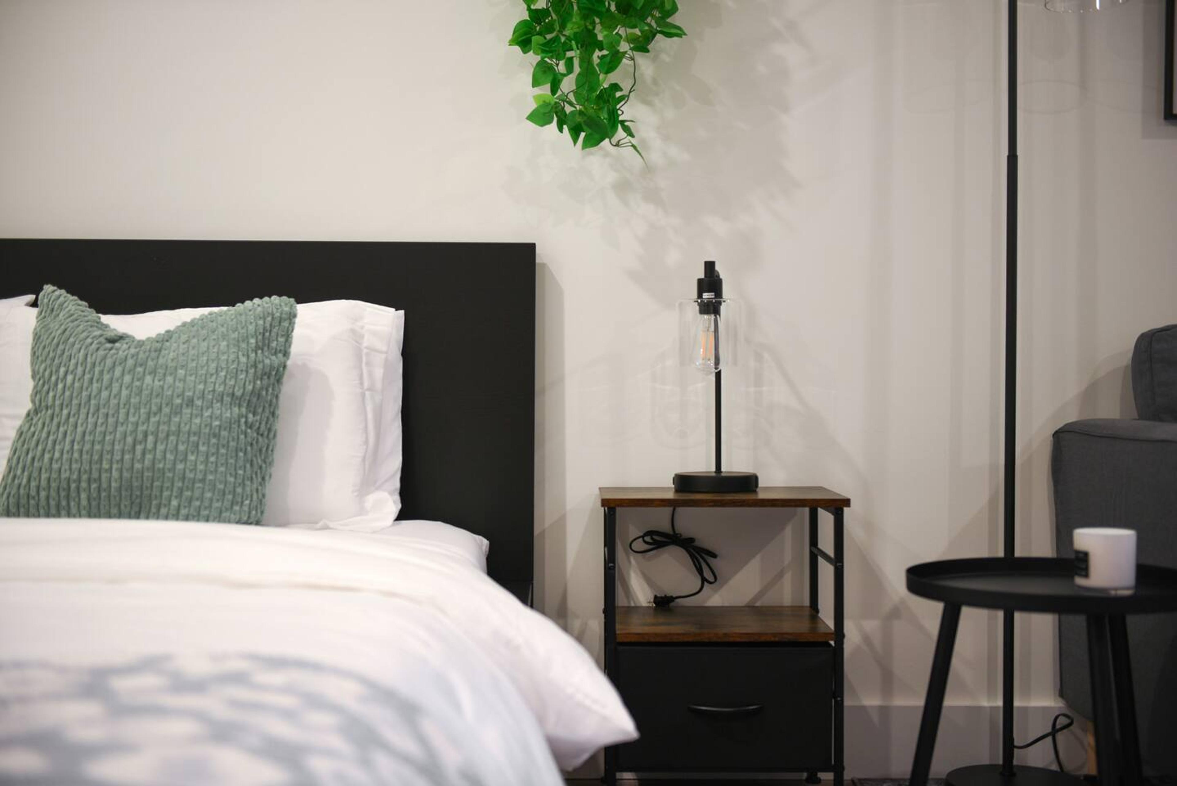 Comfy Queen Bed With small side table with storage